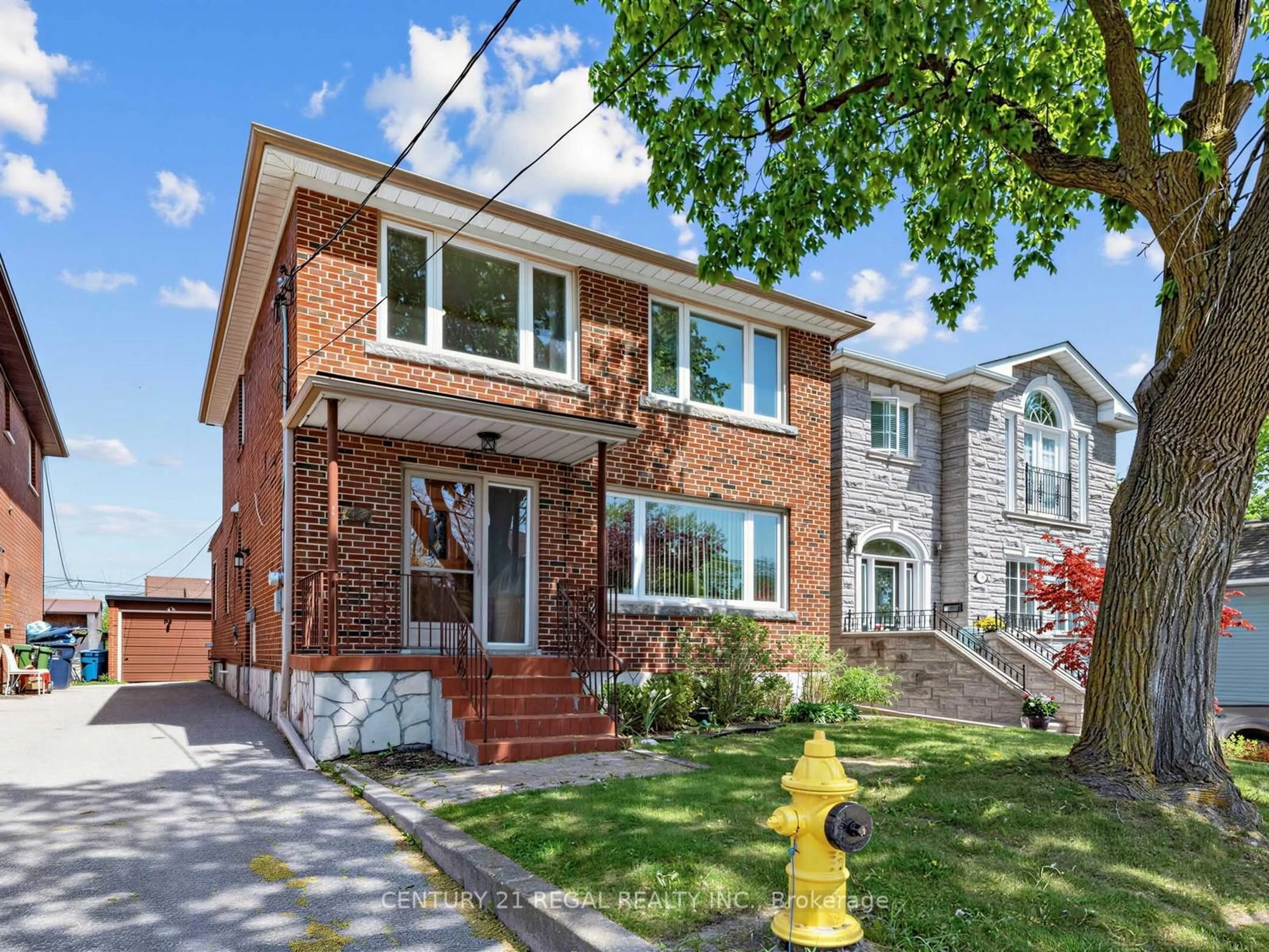 Home with brick exterior material, street for 1062 Glengrove Ave, Toronto Ontario M6B 2K2