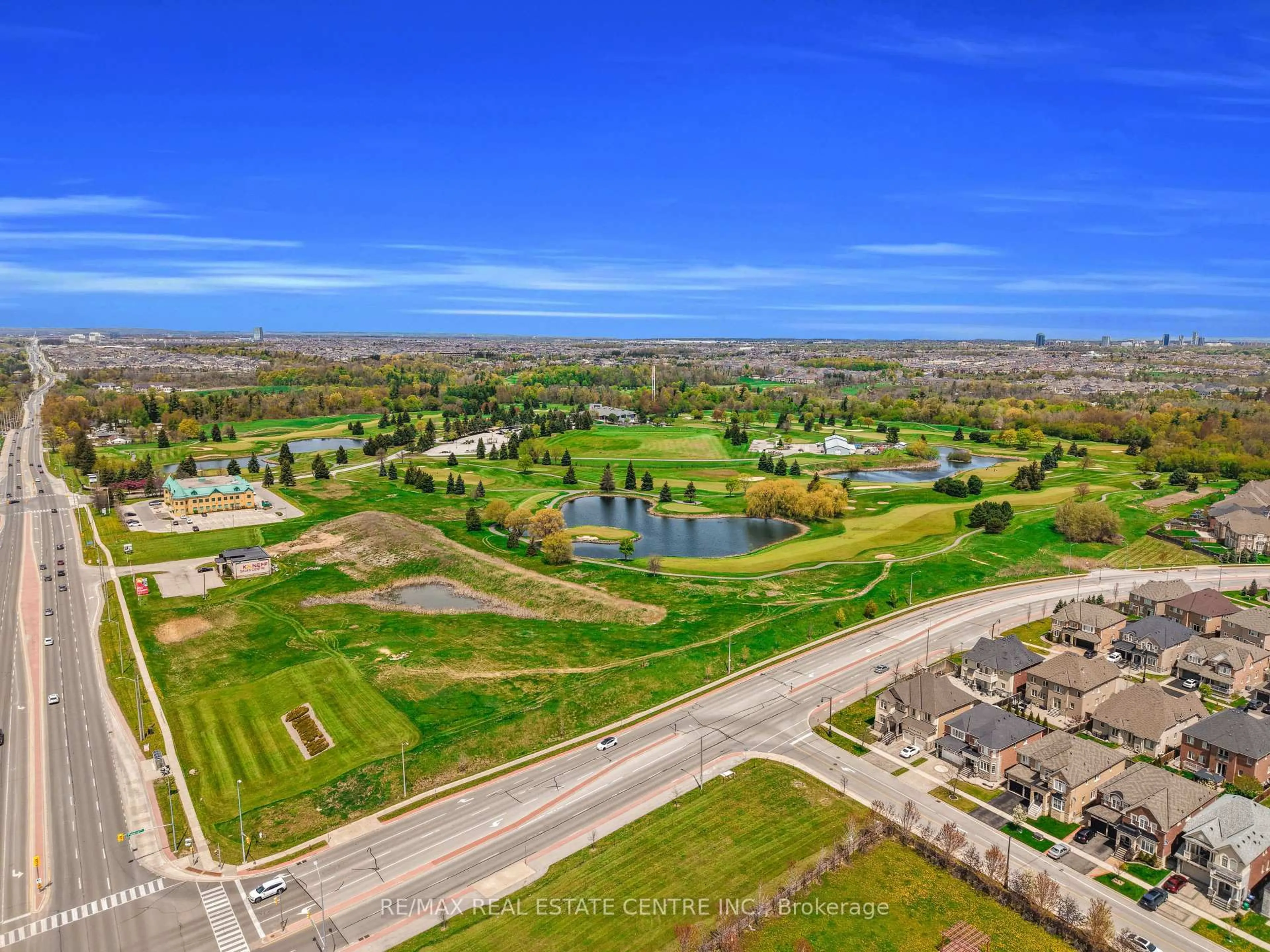 A pic from outside/outdoor area/front of a property/back of a property/a pic from drone, water/lake/river/ocean view for 24 Rising Hill Rdge, Brampton Ontario L6Y 0C3