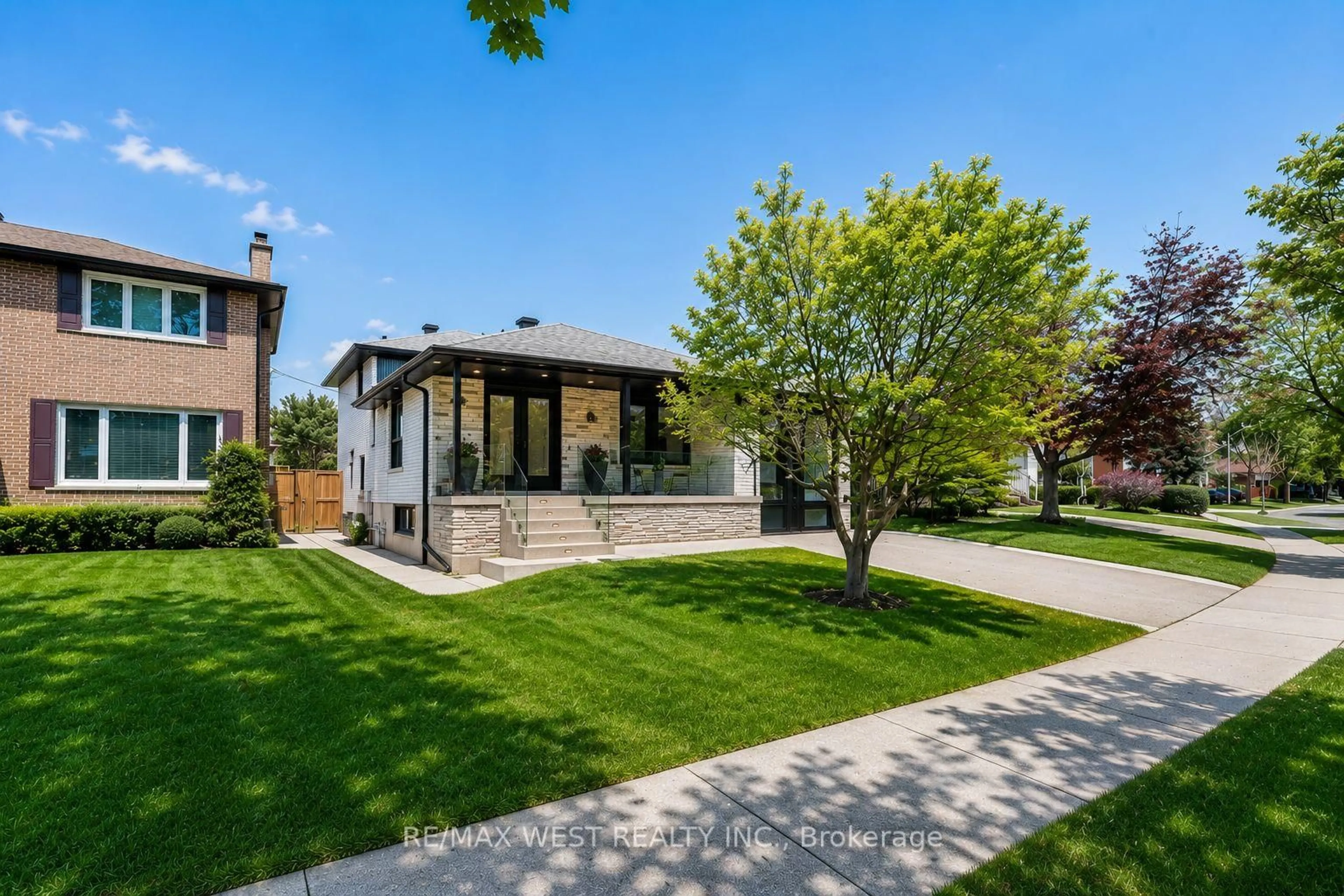 Home with brick exterior material, street for 18 Torrington Dr, Toronto Ontario M9C 3V5