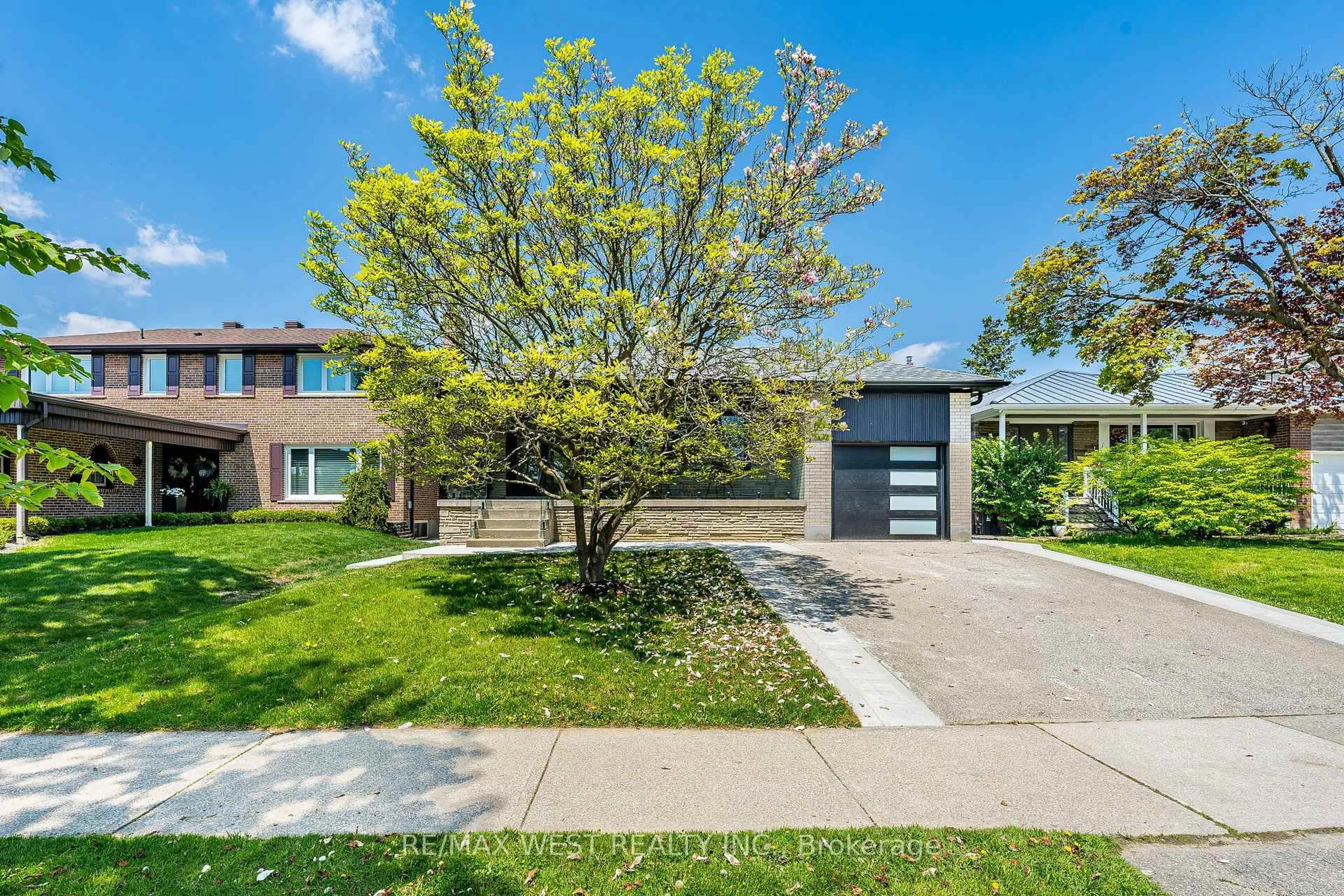 Home with brick exterior material, street for 18 Torrington Dr, Toronto Ontario M9C 3V5