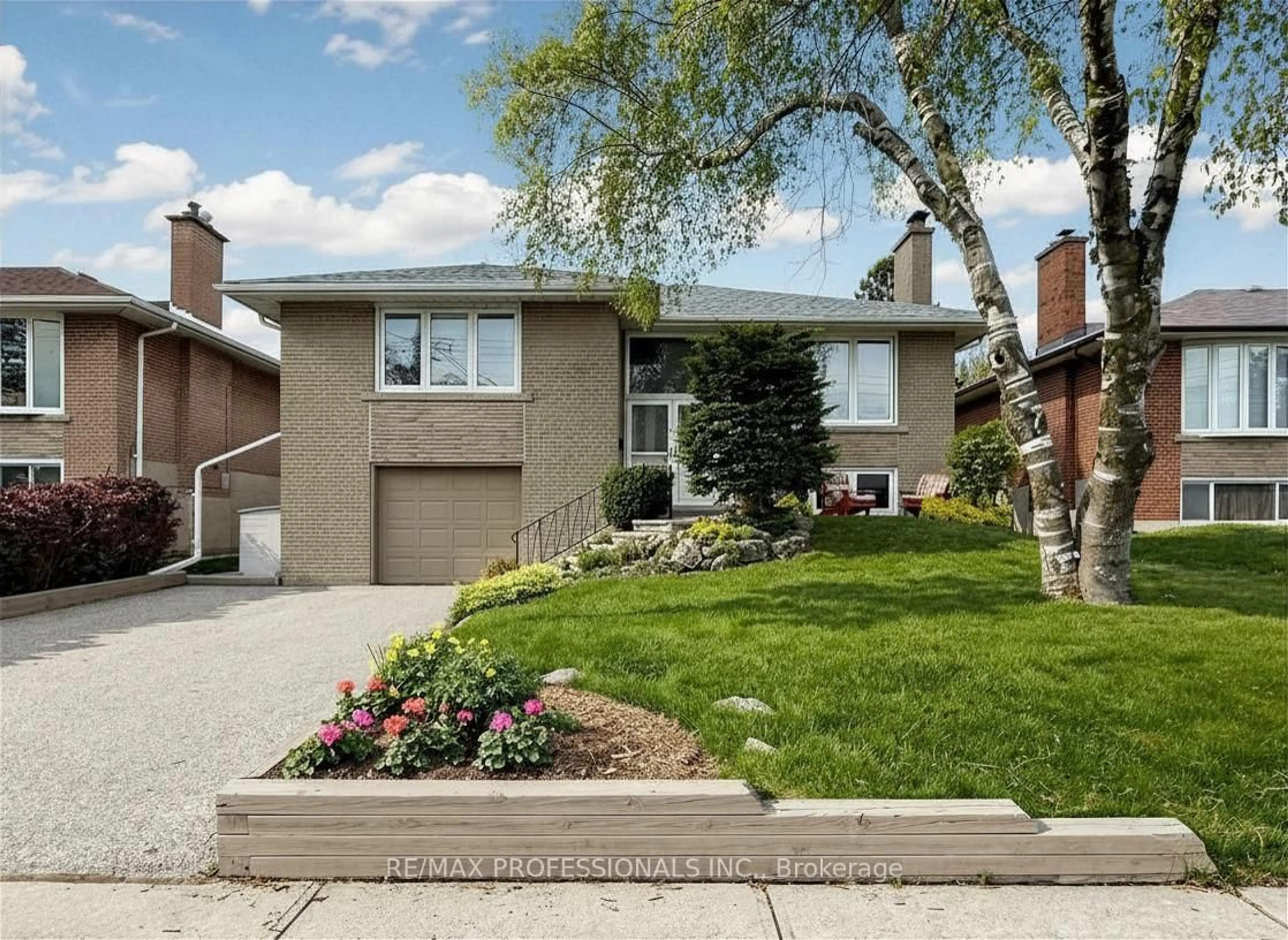 Home with brick exterior material, street for 24 Breadner Dr, Toronto Ontario M9R 3M4