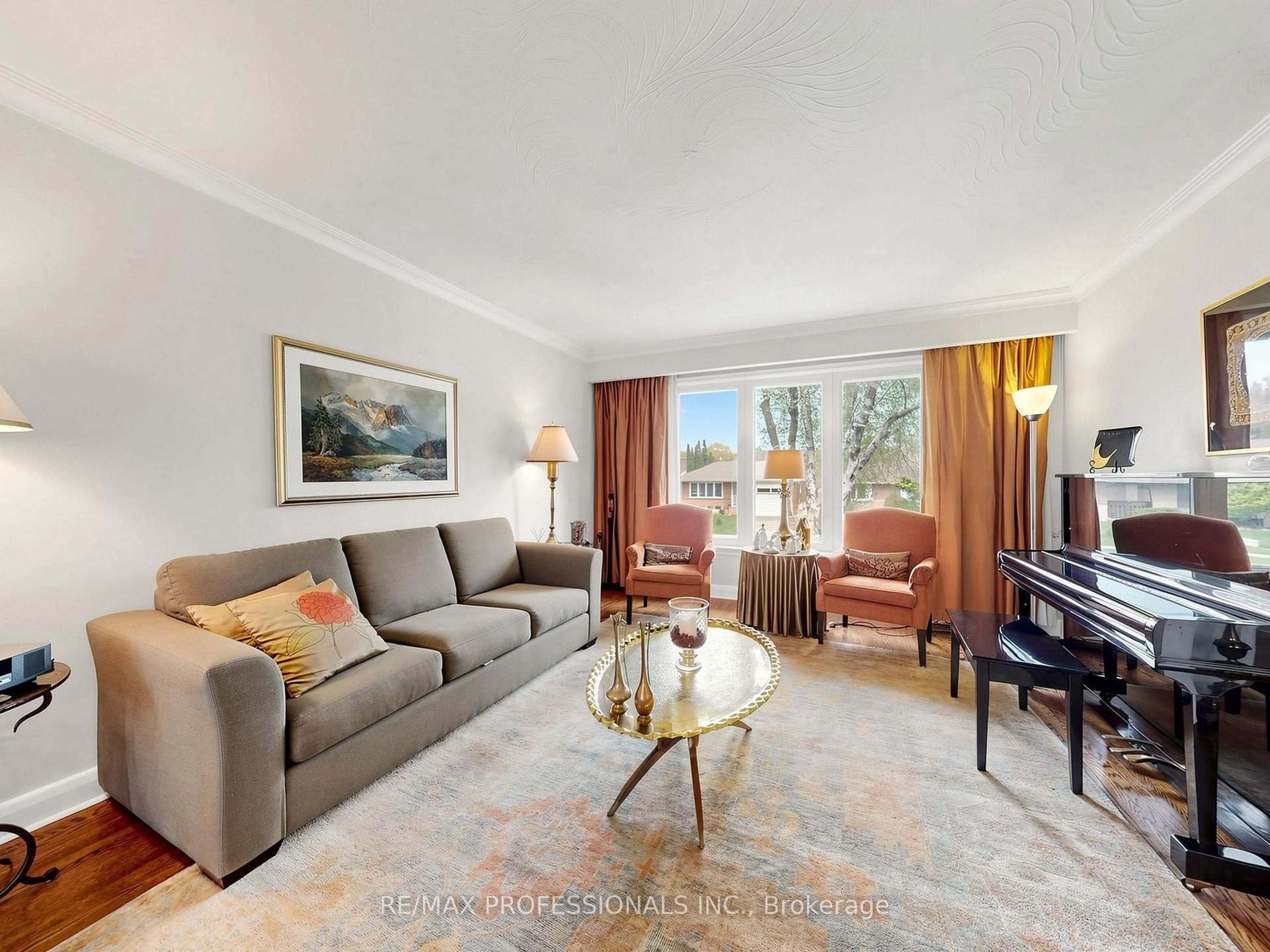 Living room with furniture, unknown for 24 Breadner Dr, Toronto Ontario M9R 3M4
