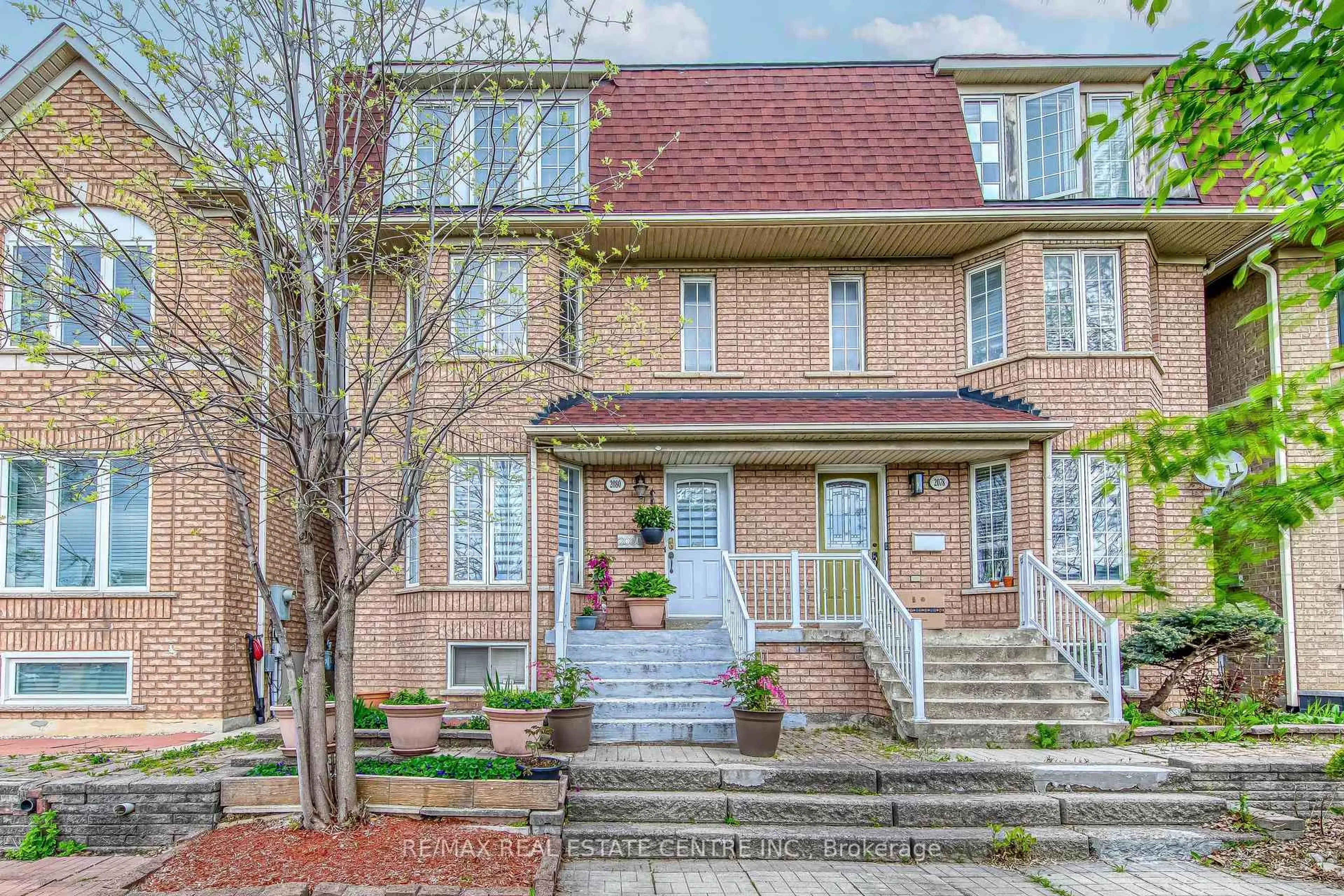 Home with brick exterior material, street for 2080 St Clair Ave, Toronto Ontario M6N 1K3