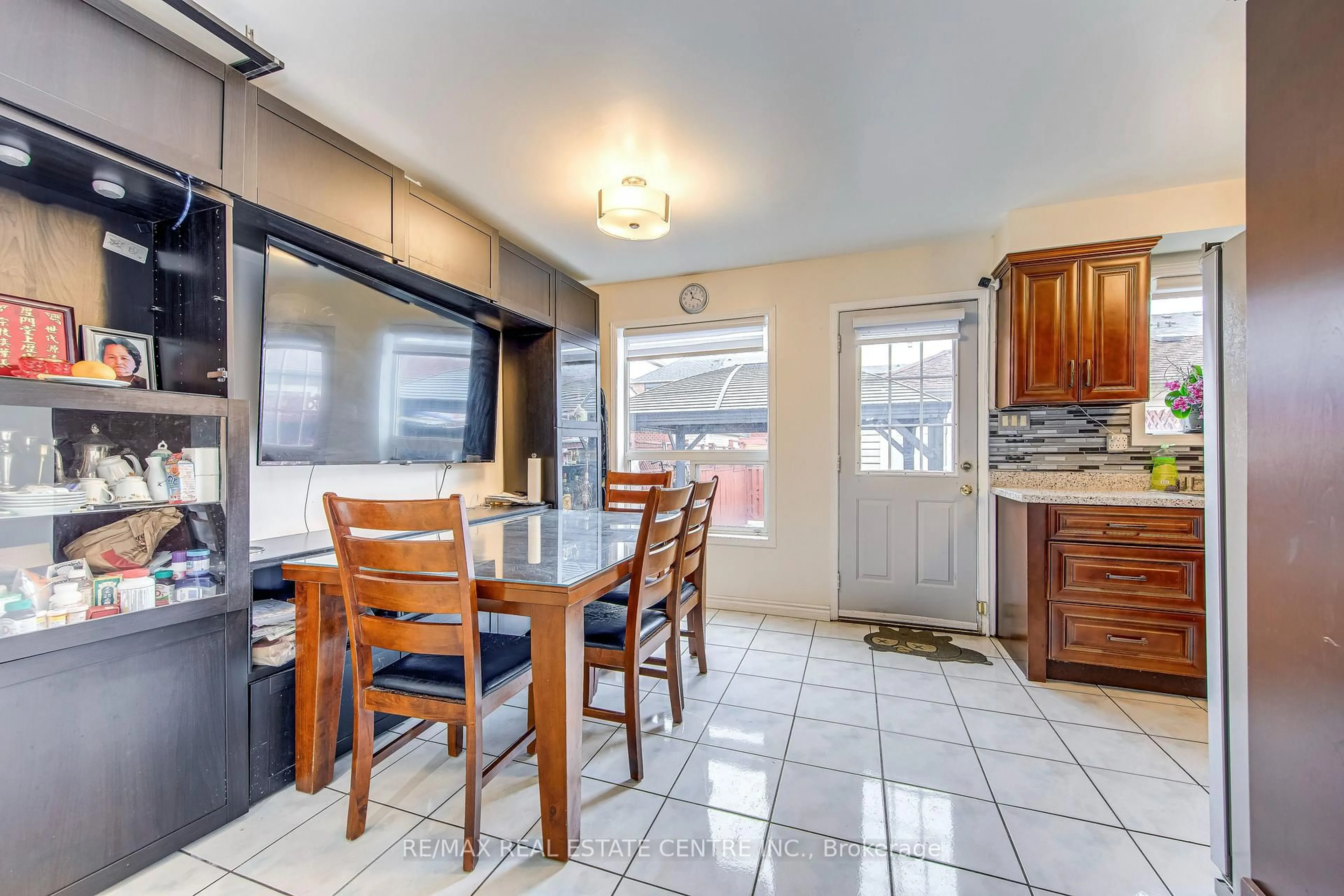 Open concept kitchen, ceramic/tile floor for 2080 St Clair Ave, Toronto Ontario M6N 1K3