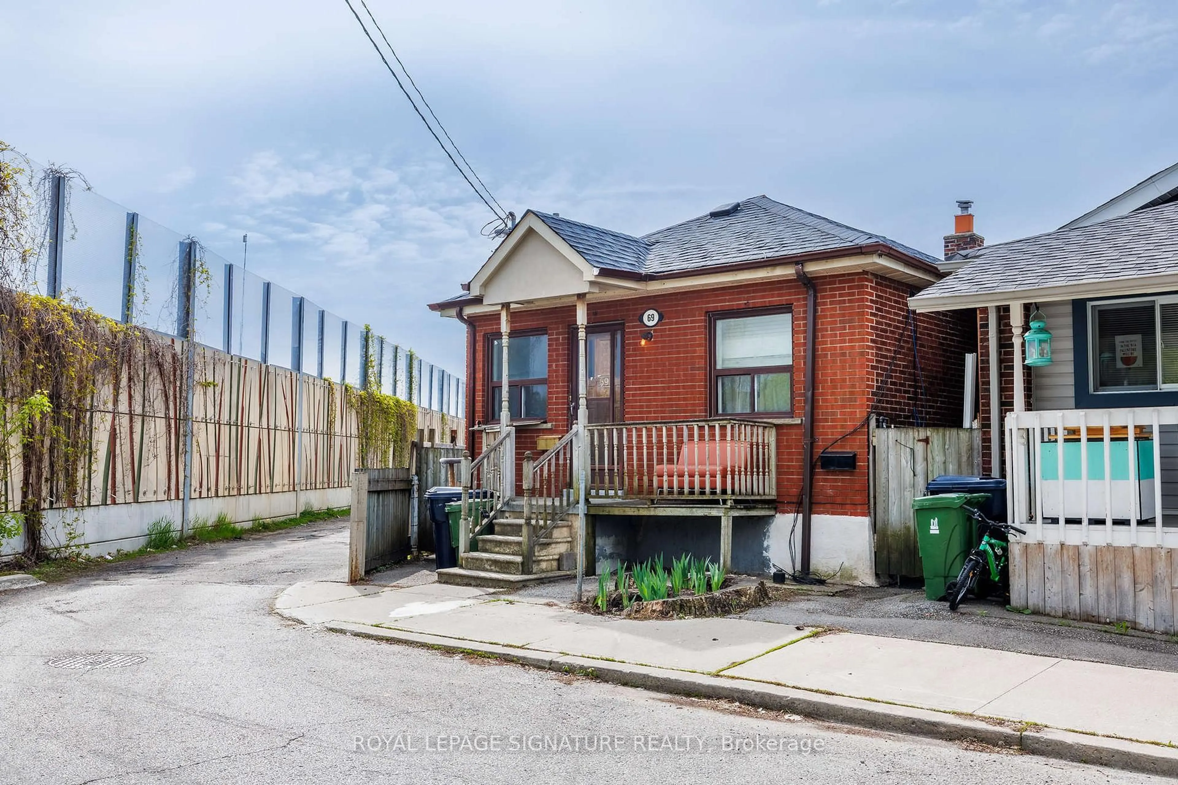 Home with brick exterior material, street for 69 Nickle St, Toronto Ontario M6M 2H7