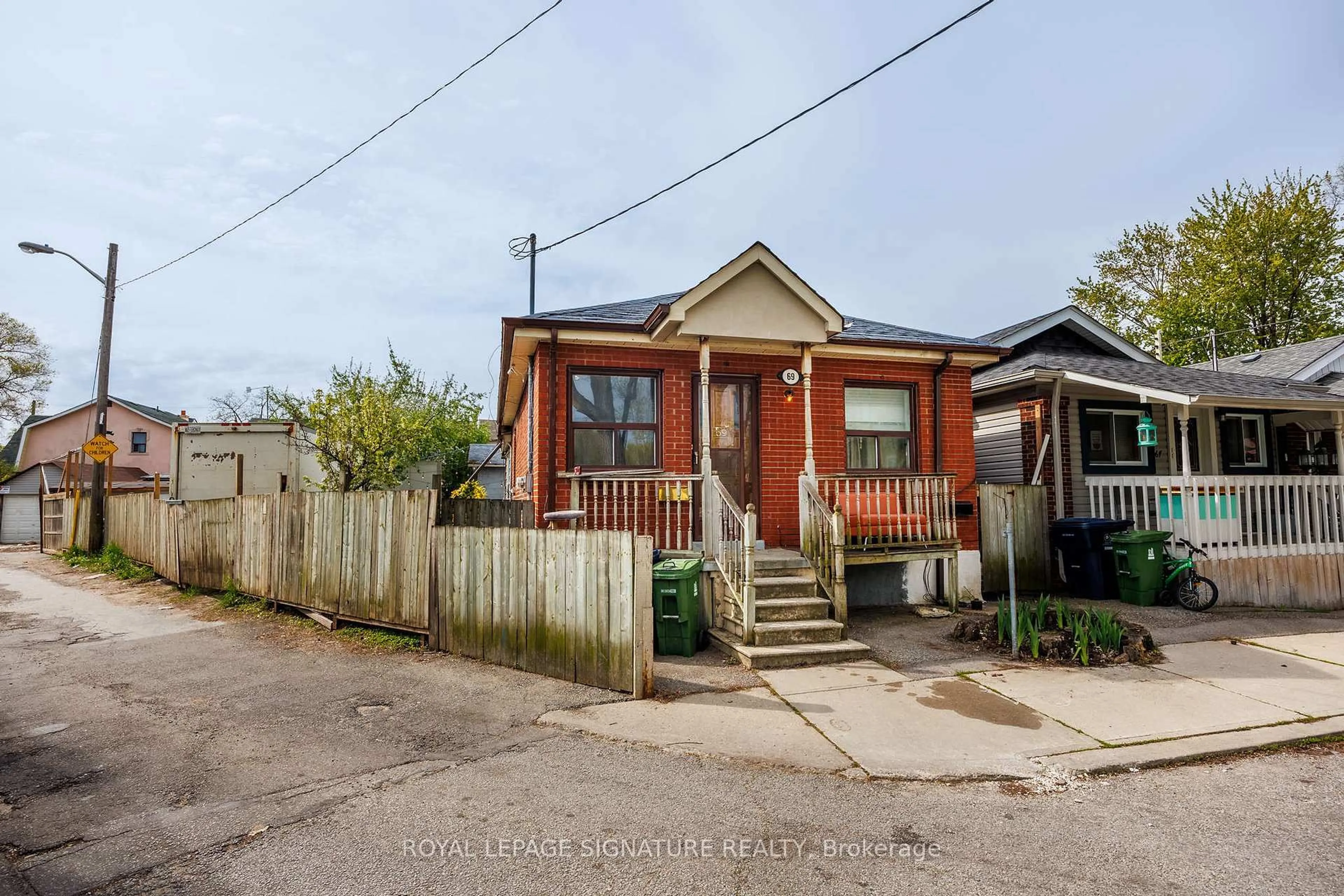 Home with brick exterior material, street for 69 Nickle St, Toronto Ontario M6M 2H7
