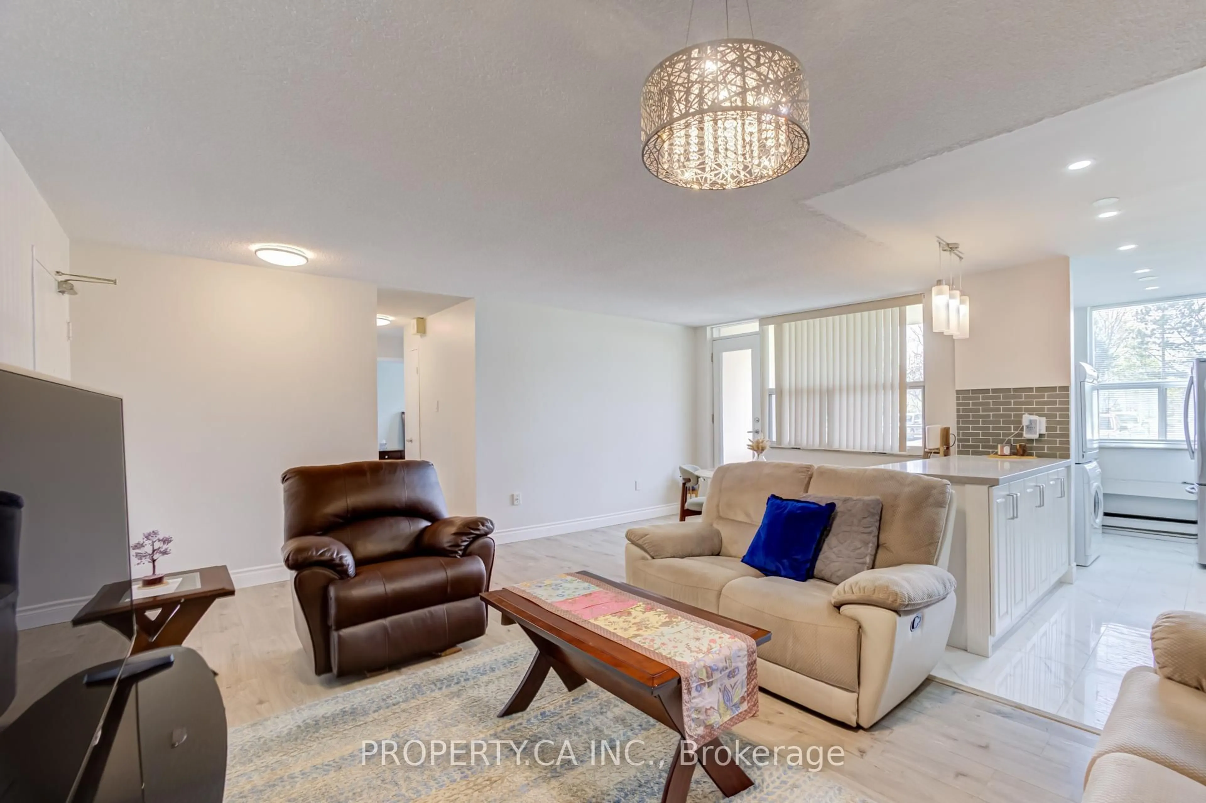 Living room with furniture, unknown for 966 Inverhouse Dr #109, Mississauga Ontario L5J 4B6
