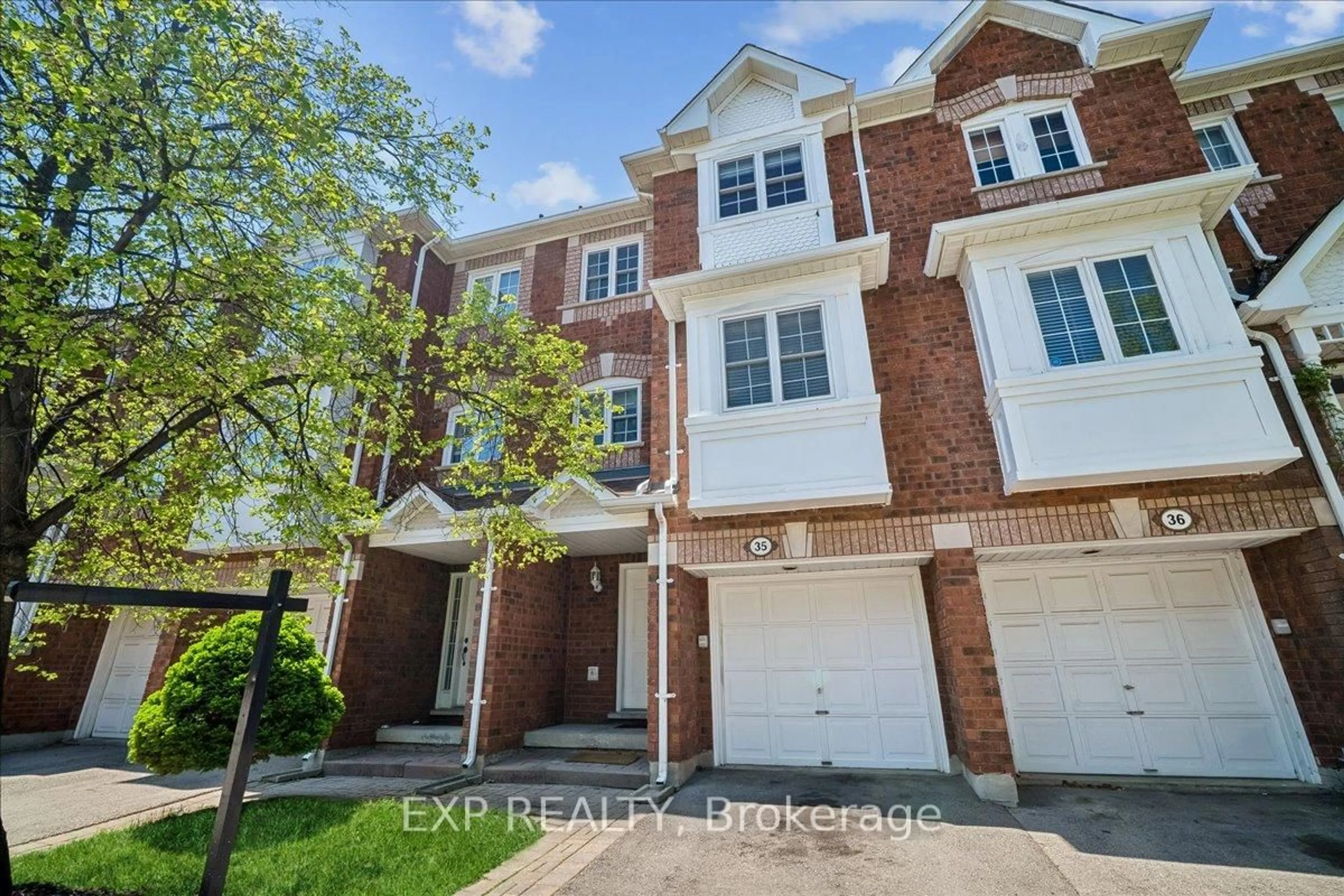 Home with brick exterior material, street for 6060 Snowy Owl Cres #35, Mississauga Ontario L5N 7K3