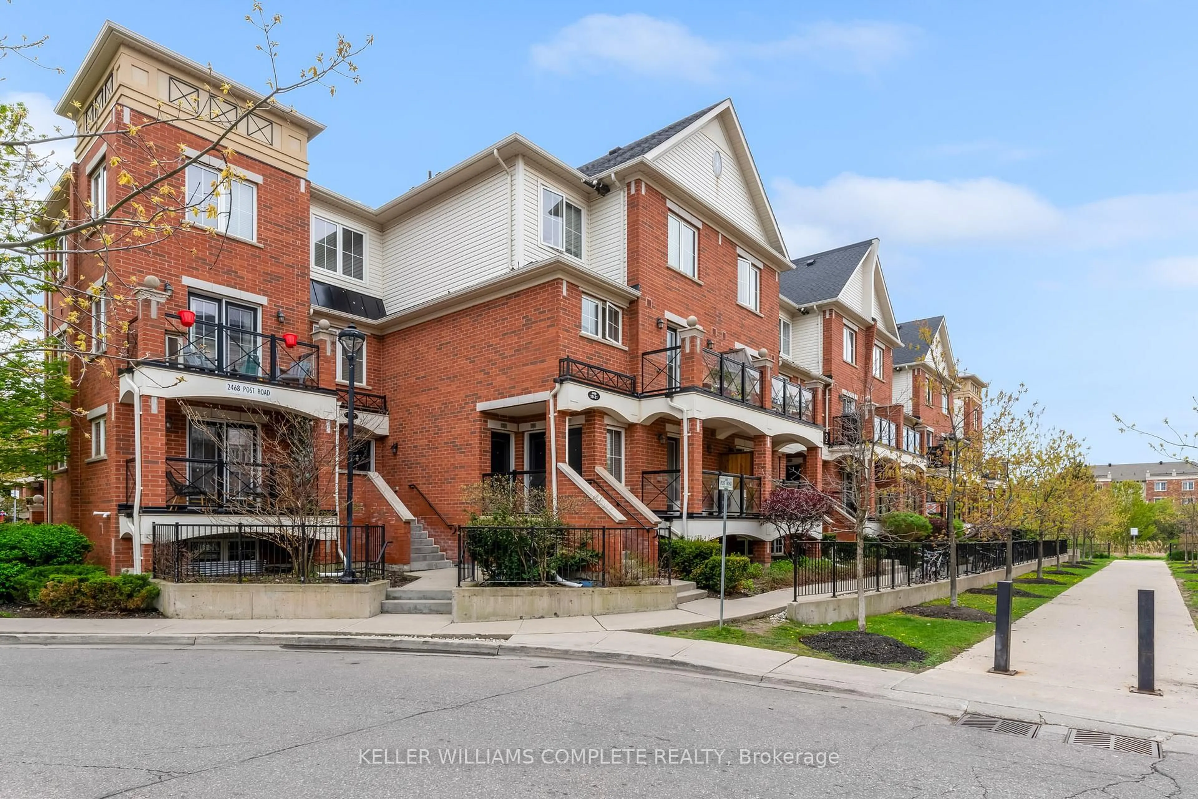 Home with brick exterior material, street for 2468 POST Rd #28, Oakville Ontario L6H 0J2