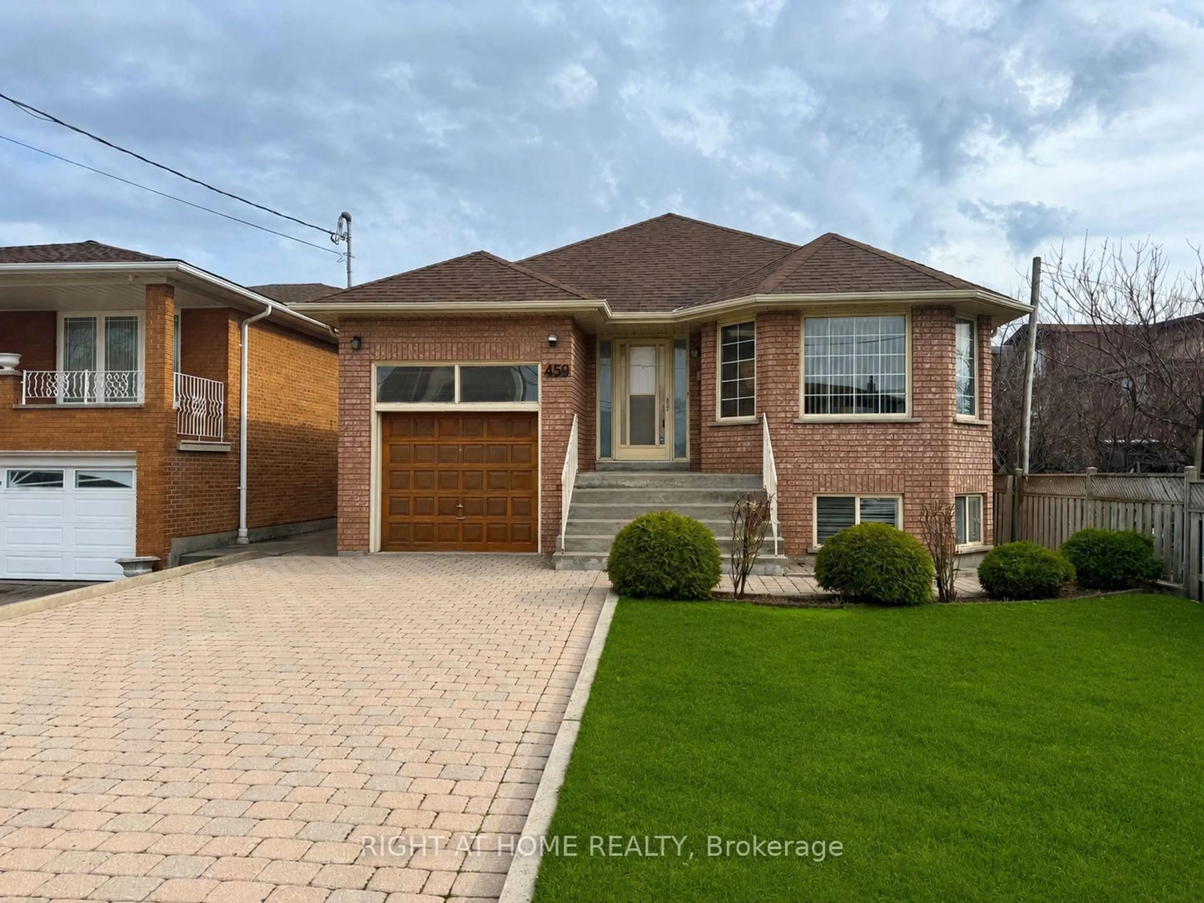 Home with brick exterior material, street for 459 Maple Leaf Dr, Toronto Ontario M6L 1R1