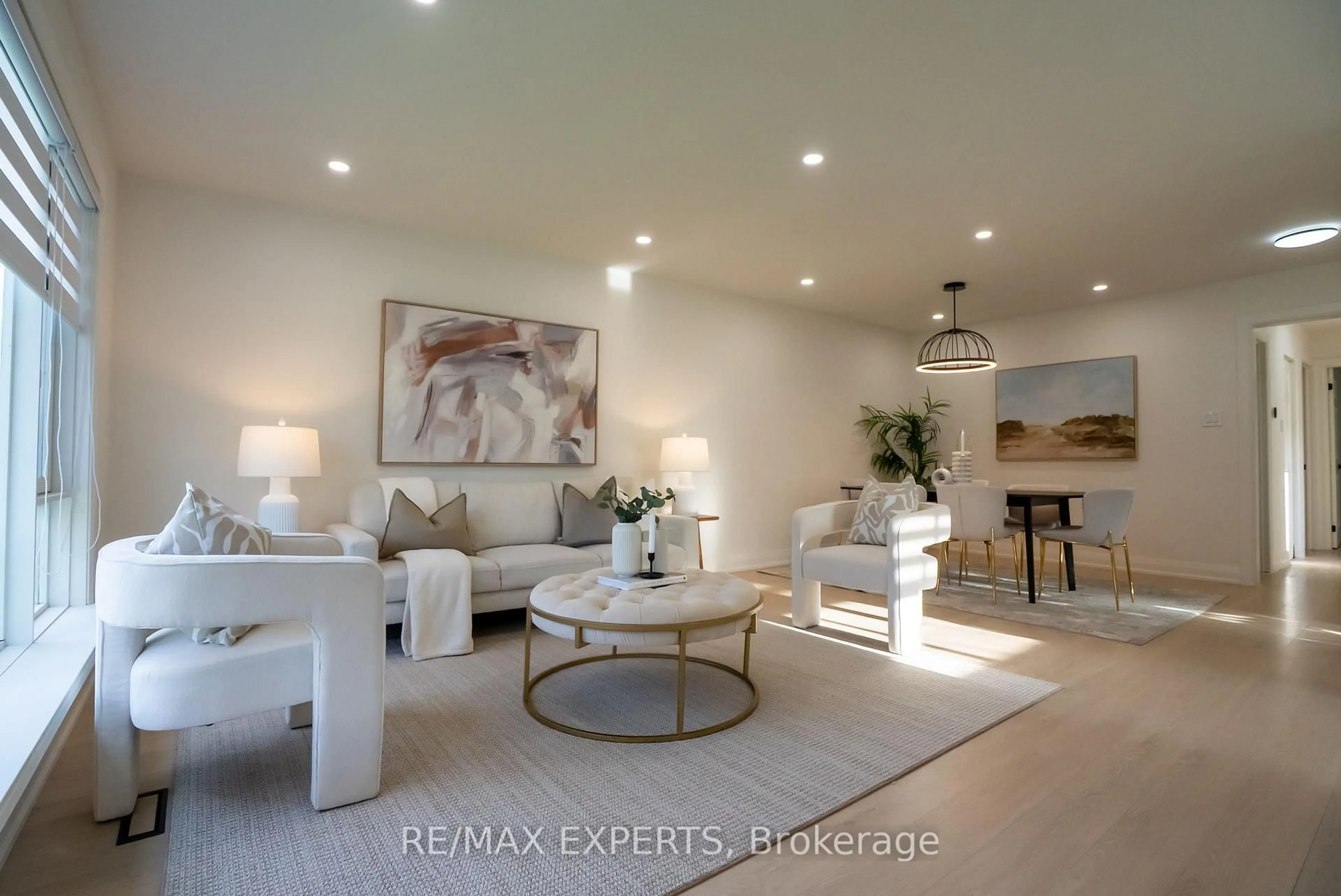 Living room with furniture, unknown for 27 Fallingdale Cres, Brampton Ontario L6T 3J5