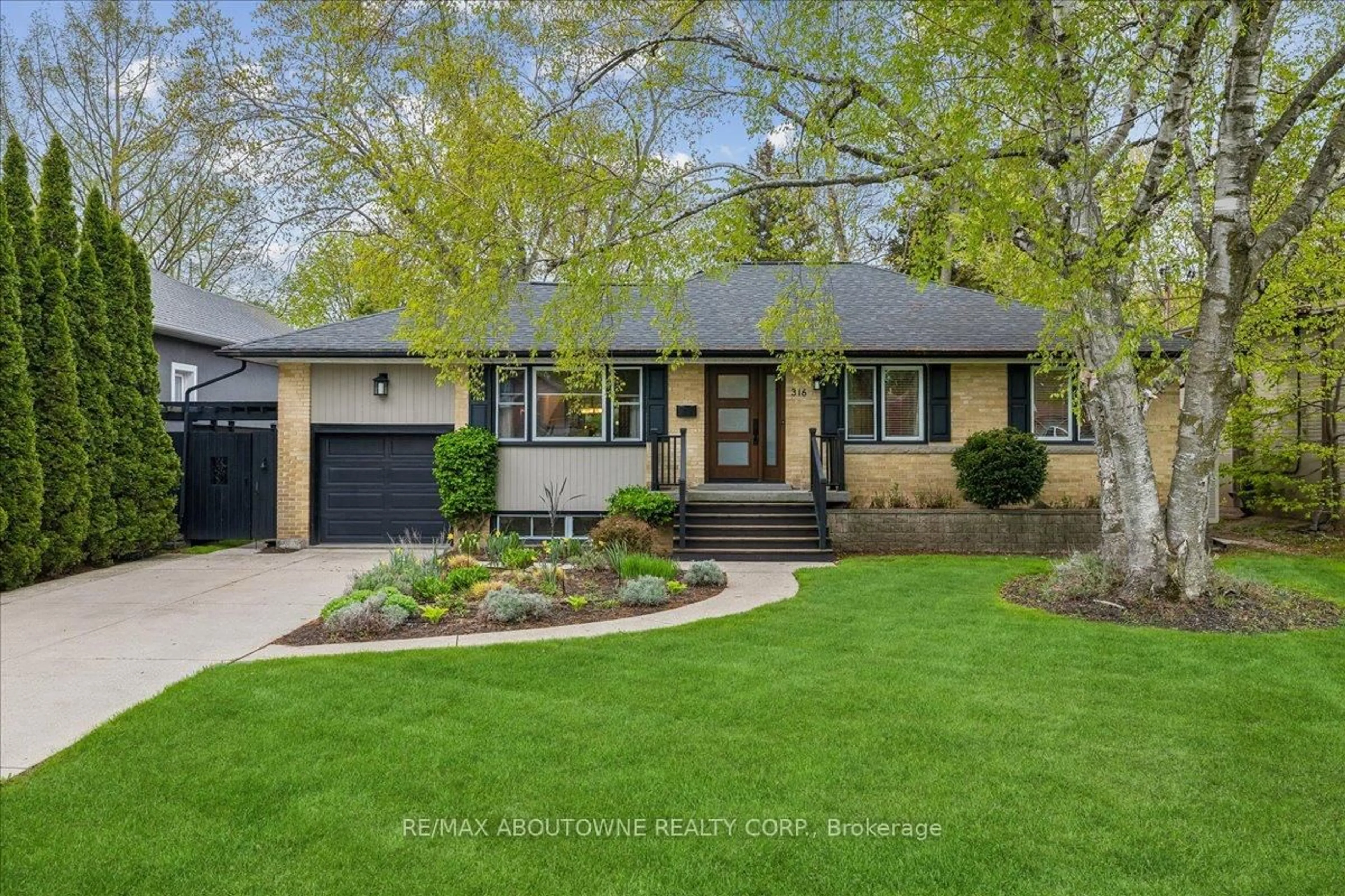 Home with brick exterior material, street for 316 River Side Dr, Oakville Ontario L6K 3N4