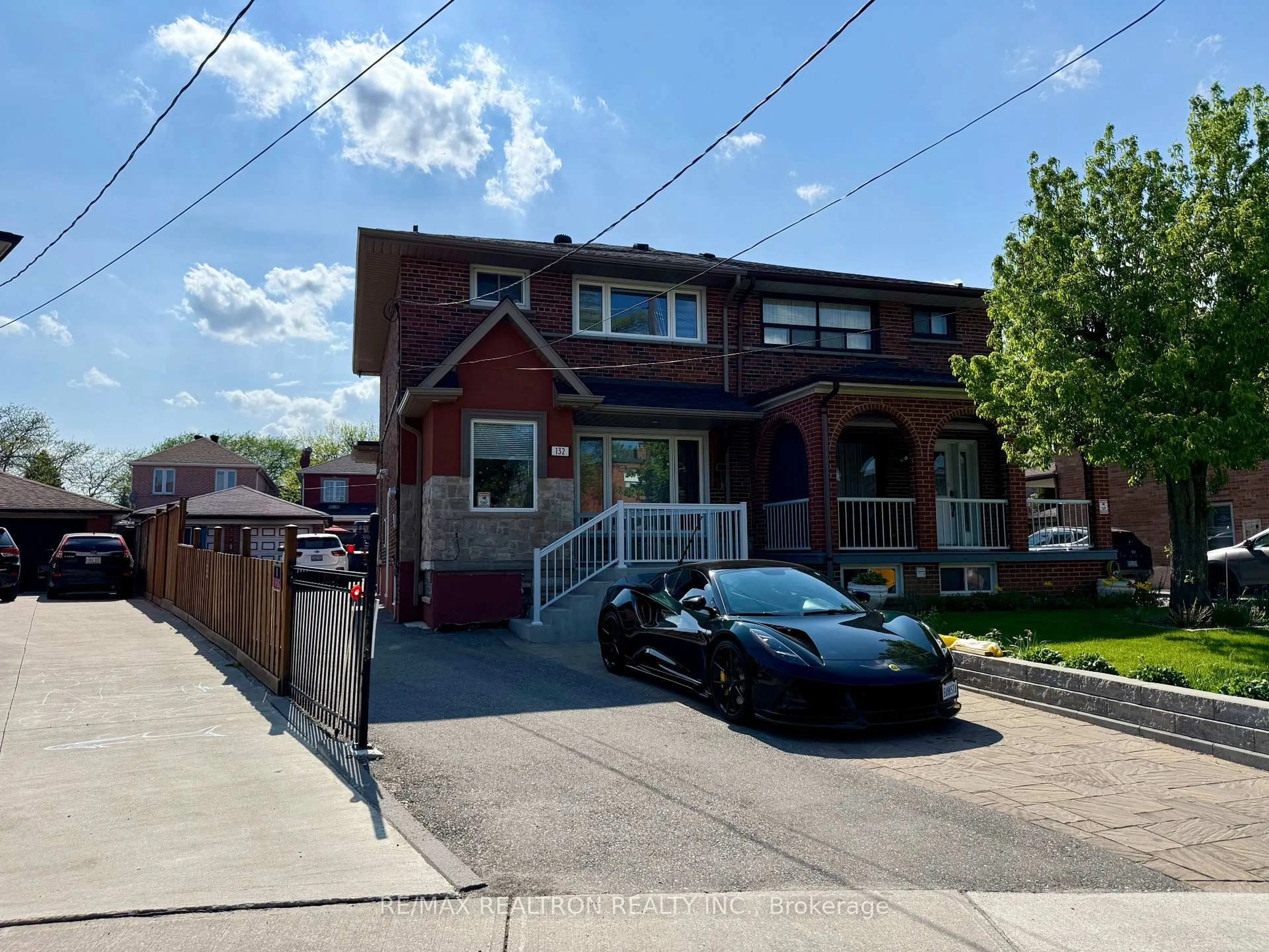 Home with brick exterior material, street for 132 Brookhaven Dr, Toronto Ontario M6M 4P2
