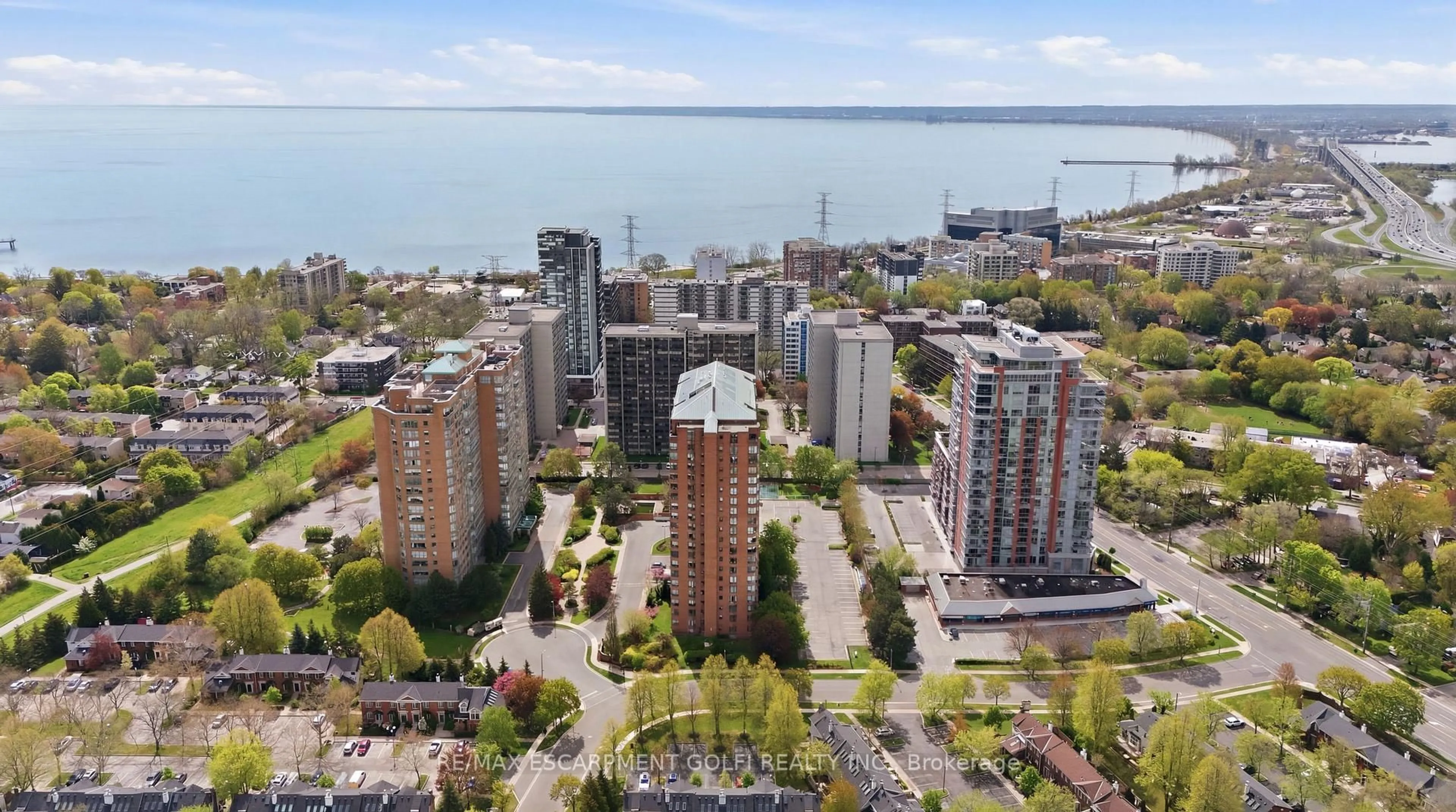 A pic from outside/outdoor area/front of a property/back of a property/a pic from drone, city buildings view from balcony for 1270 Maple Crossing Blvd #208, Burlington Ontario L7S 2J3