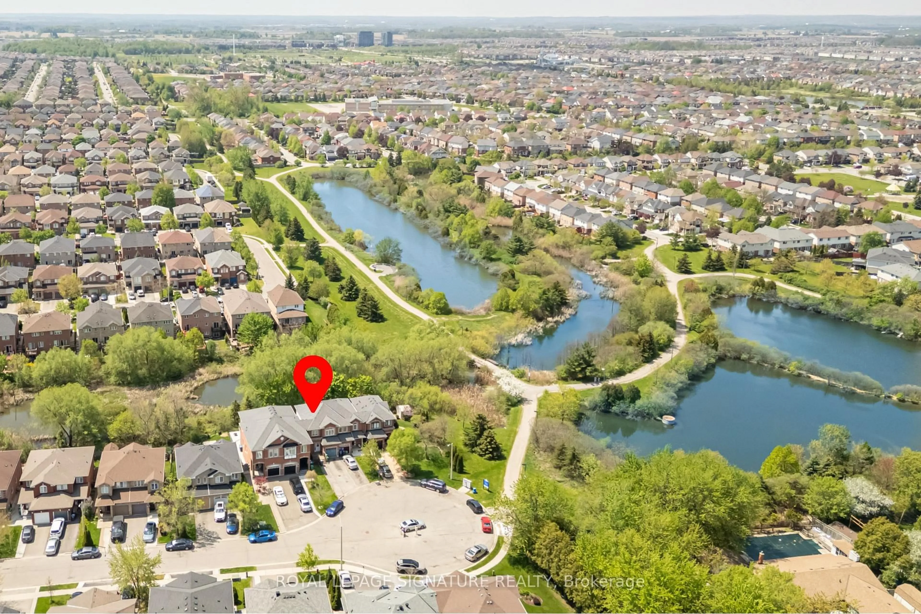 A pic from outside/outdoor area/front of a property/back of a property/a pic from drone, water/lake/river/ocean view for 42 Corvette Crt, Brampton Ontario L7A 2H8