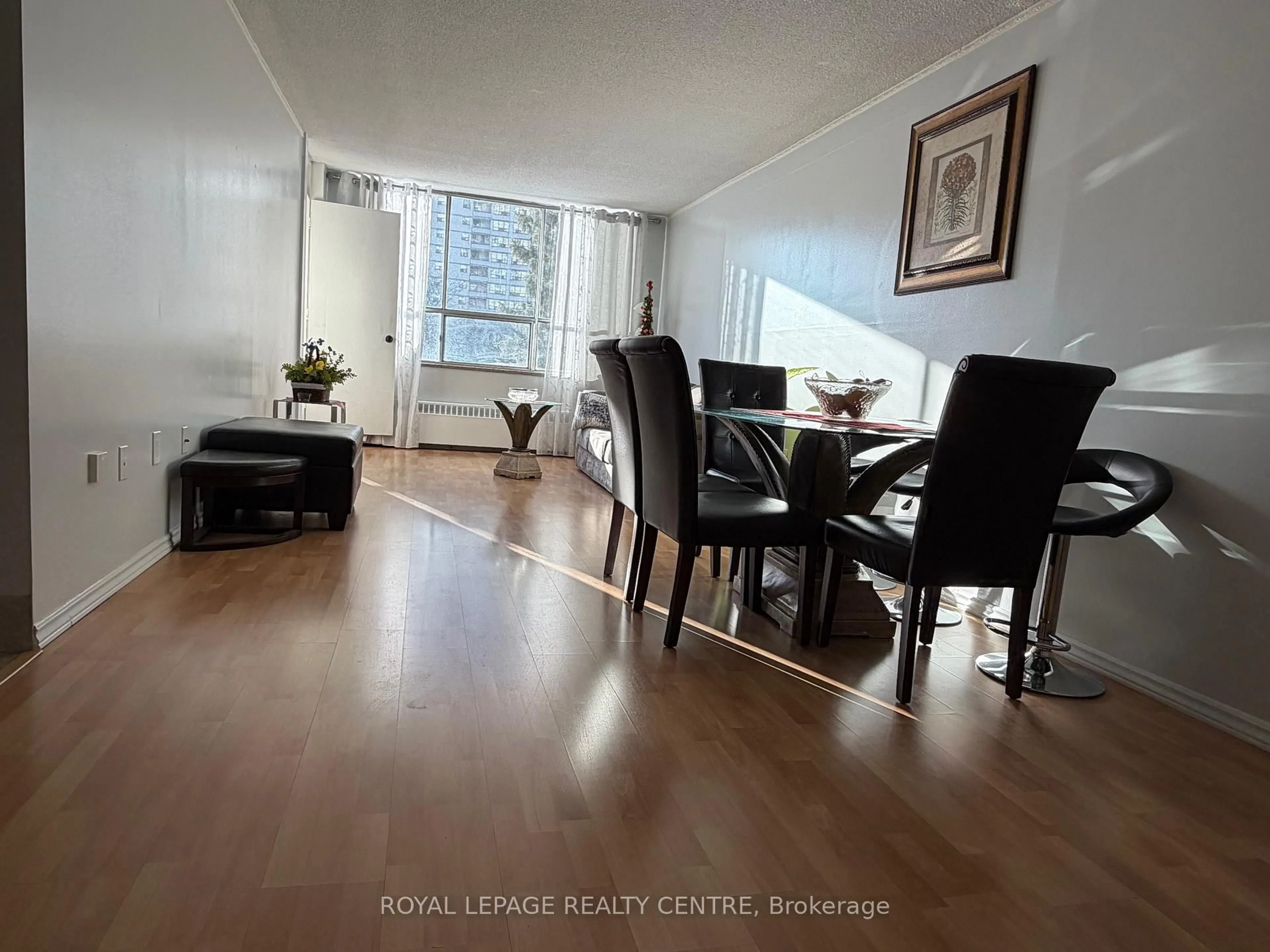 Dining room, wood/laminate floor for 340 Dixon Rd #209, Toronto Ontario M9R 1T1