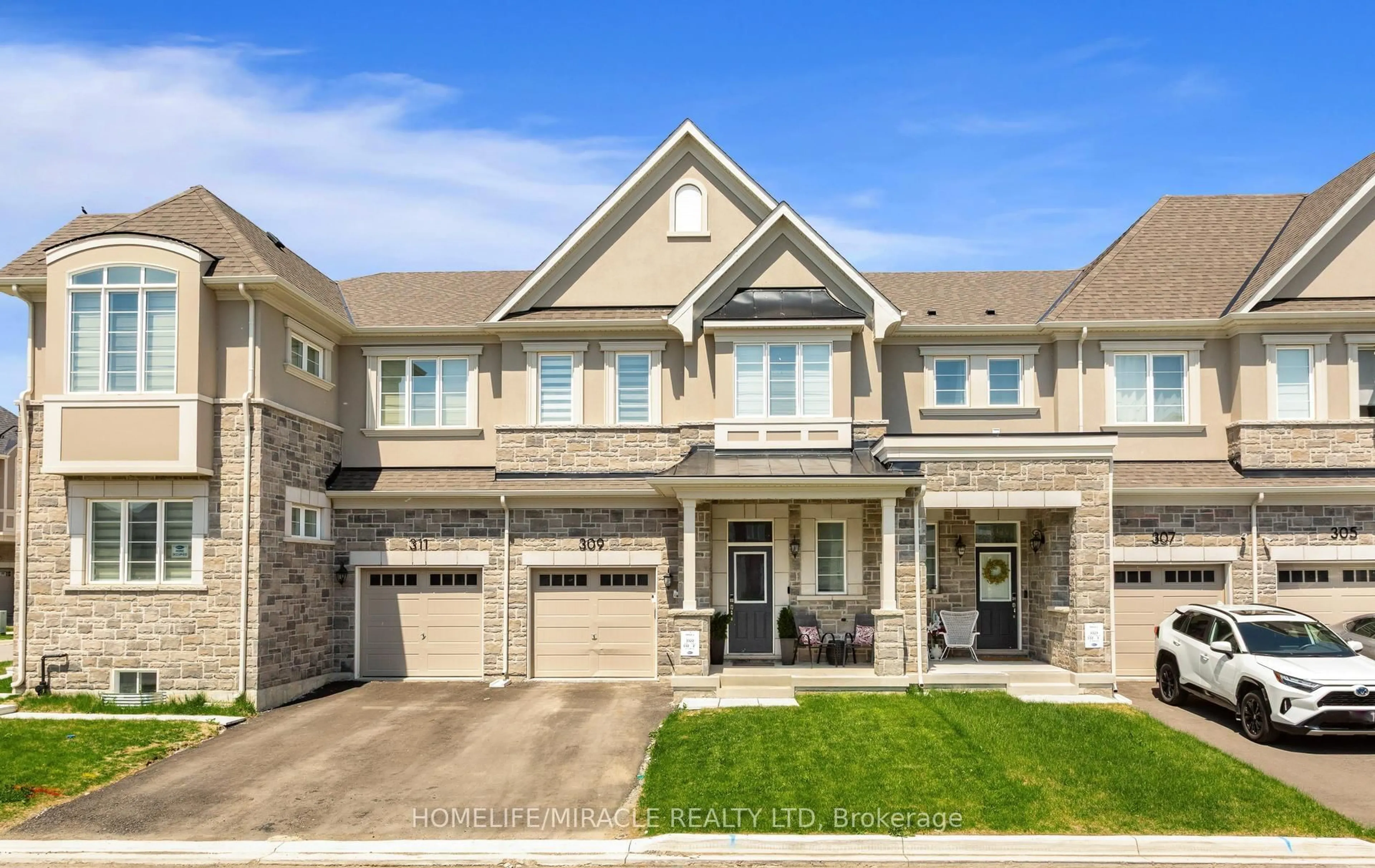 Home with brick exterior material, street for 309 Starflower Pl, Milton Ontario L9E 1Y3