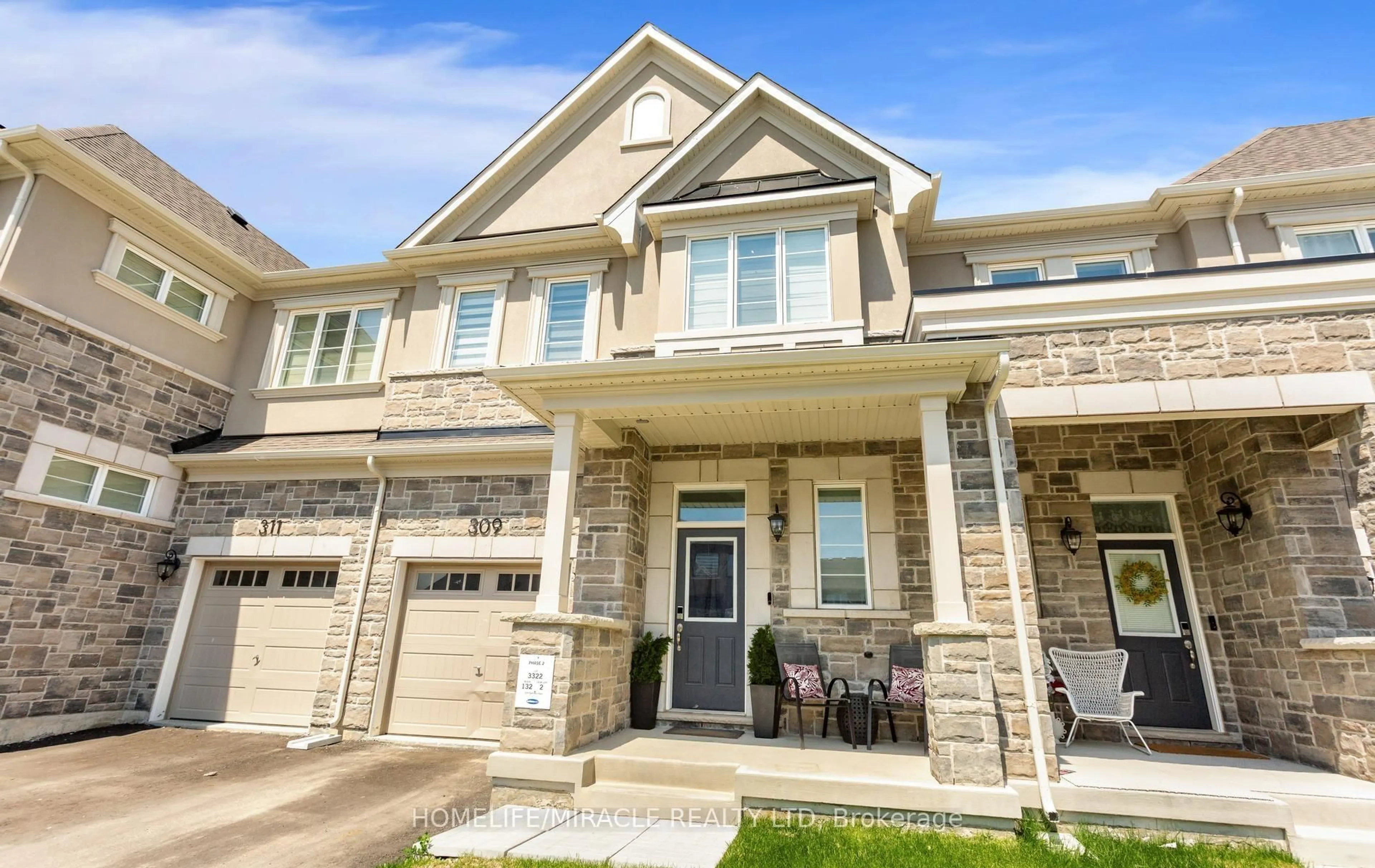 Home with brick exterior material, street for 309 Starflower Pl, Milton Ontario L9E 1Y3