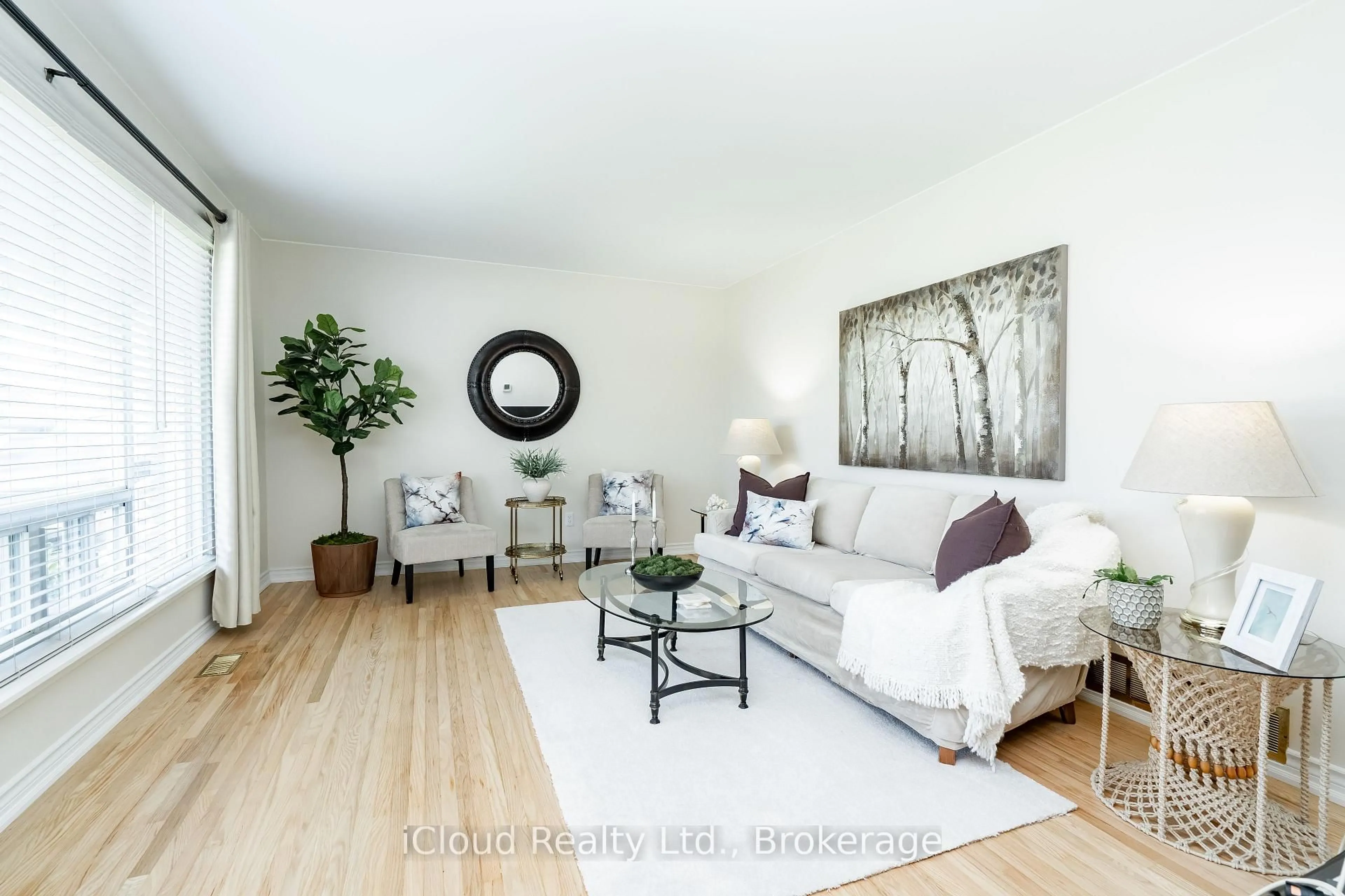 Living room with furniture, wood/laminate floor for 242 Avondale Blvd, Brampton Ontario L6T 1J4