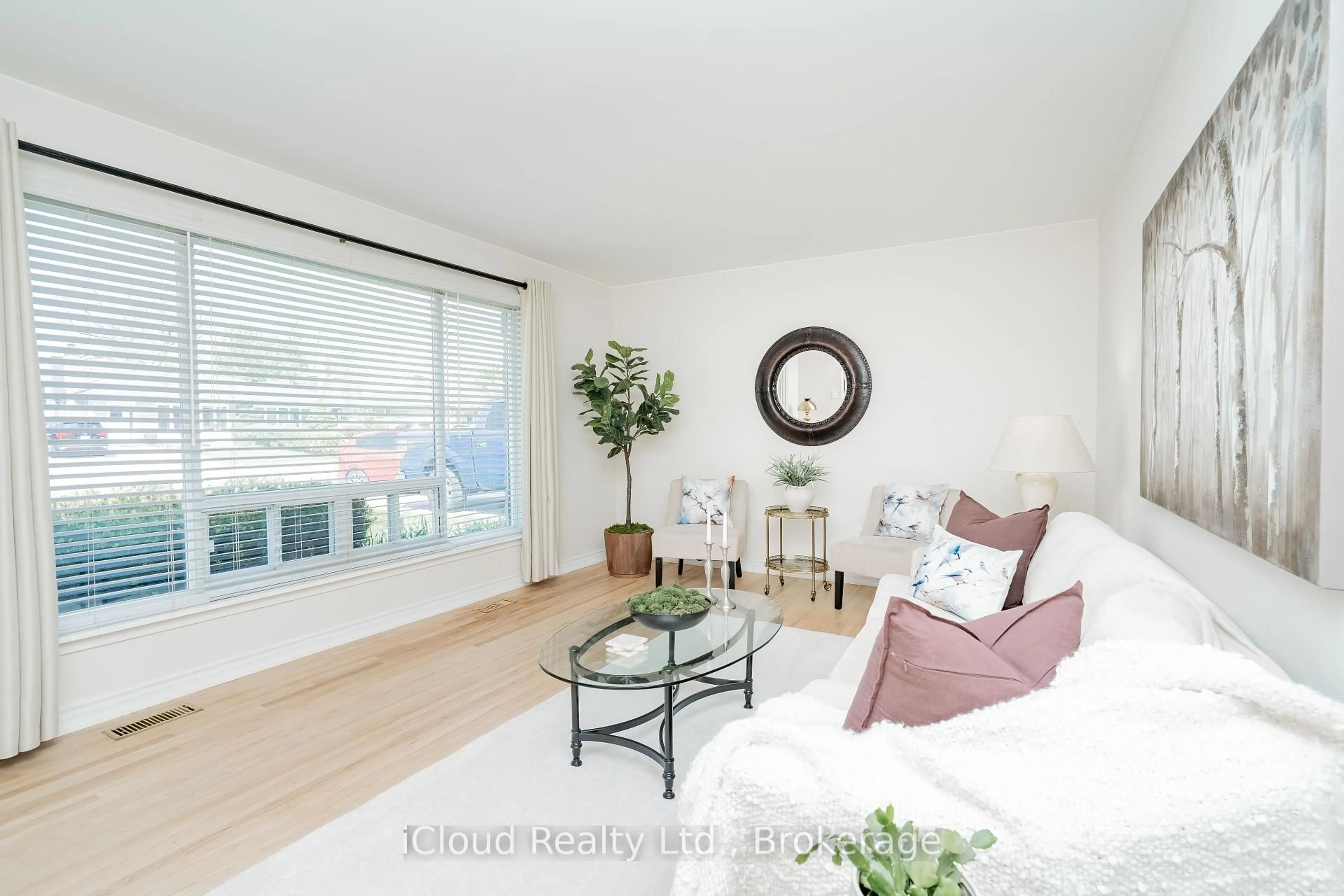 Living room with furniture, wood/laminate floor for 242 Avondale Blvd, Brampton Ontario L6T 1J4