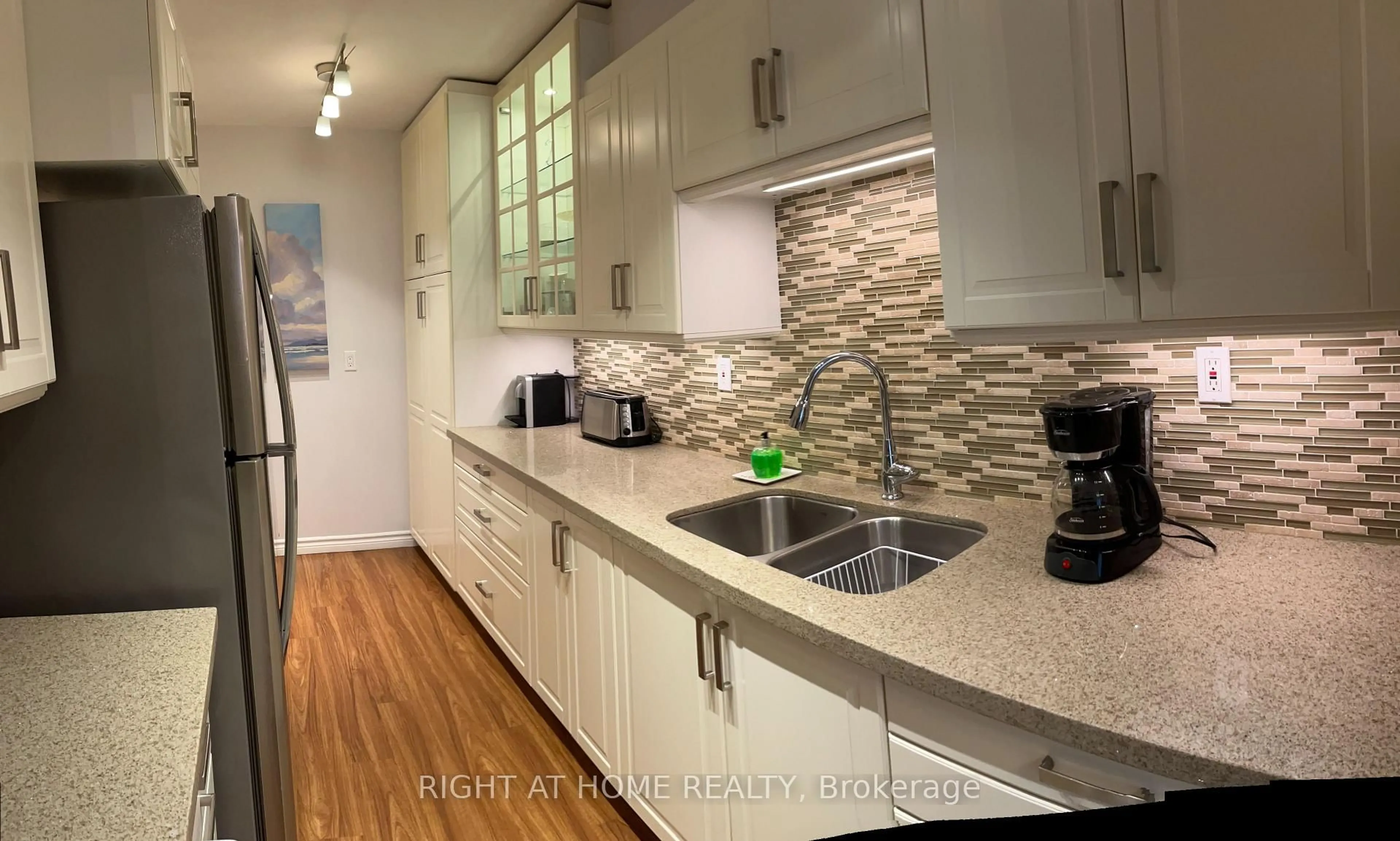 Standard kitchen, wood/laminate floor for 45 Southport St #1102, Toronto Ontario M6S 3N5