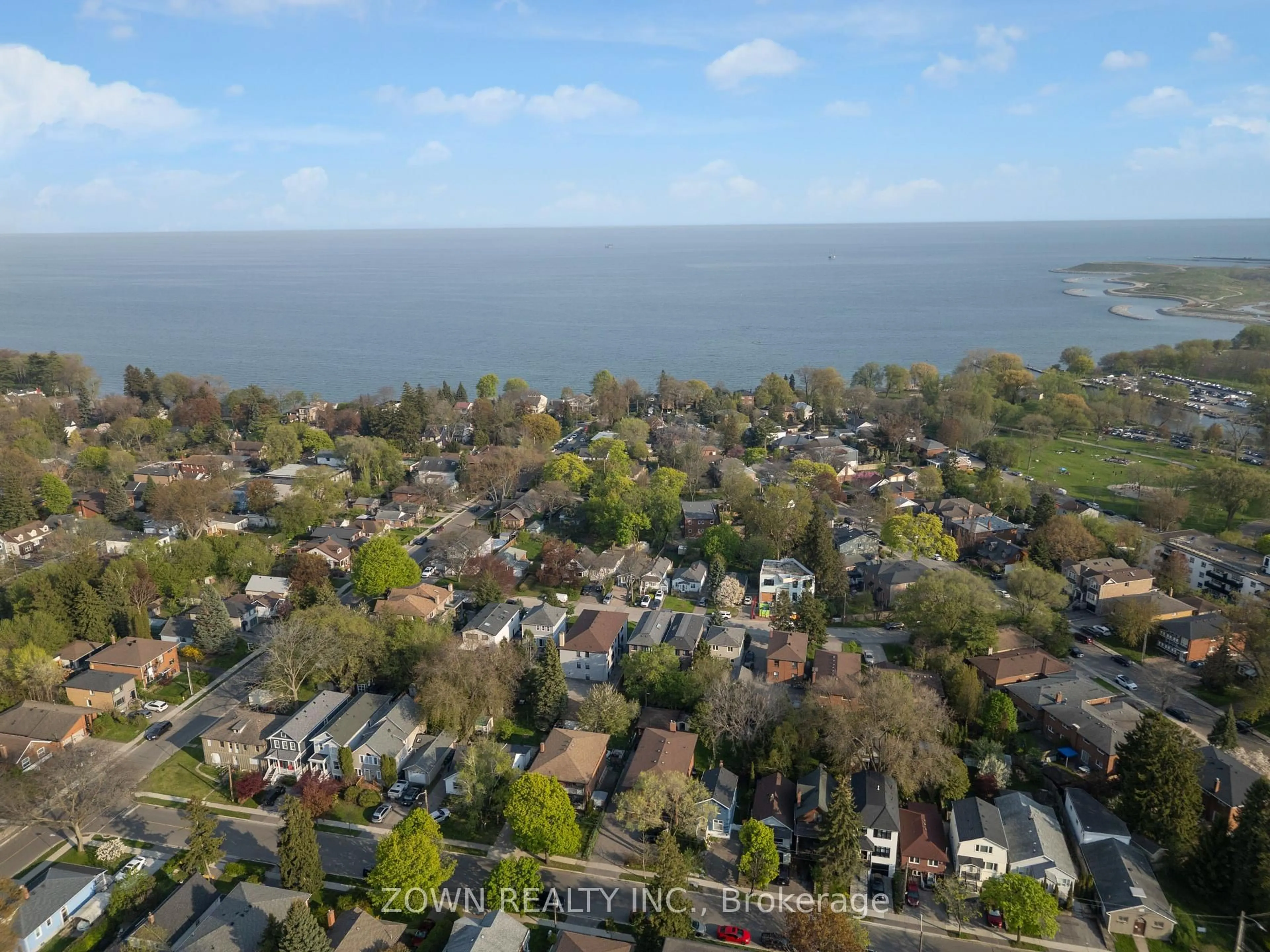 A pic from outside/outdoor area/front of a property/back of a property/a pic from drone, water/lake/river/ocean view for 3835 Lakeshore Blvd #210, Toronto Ontario M8W 1R2