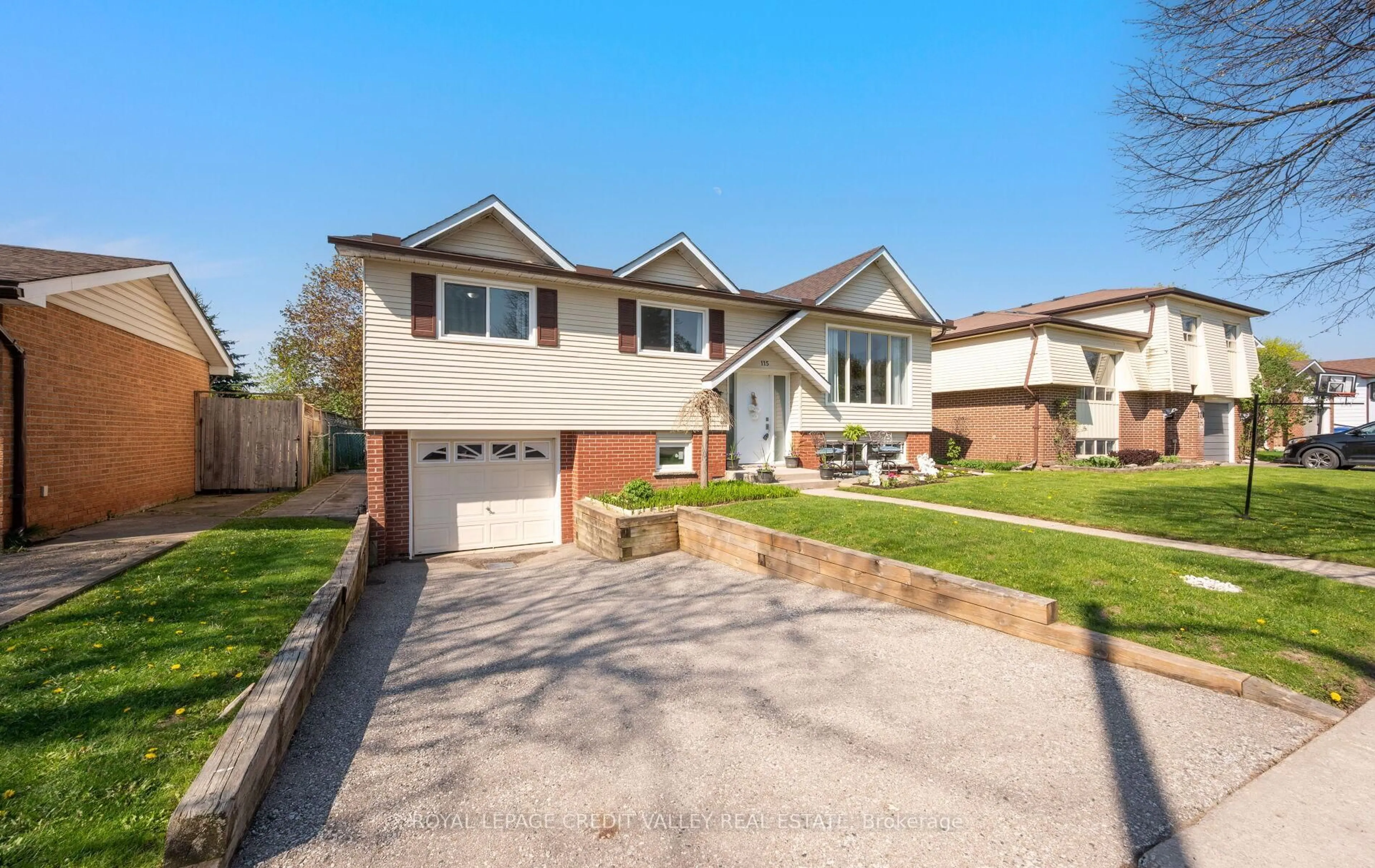 Home with brick exterior material, street for 115 Morgandale Cres, Orangeville Ontario L9W 3C6