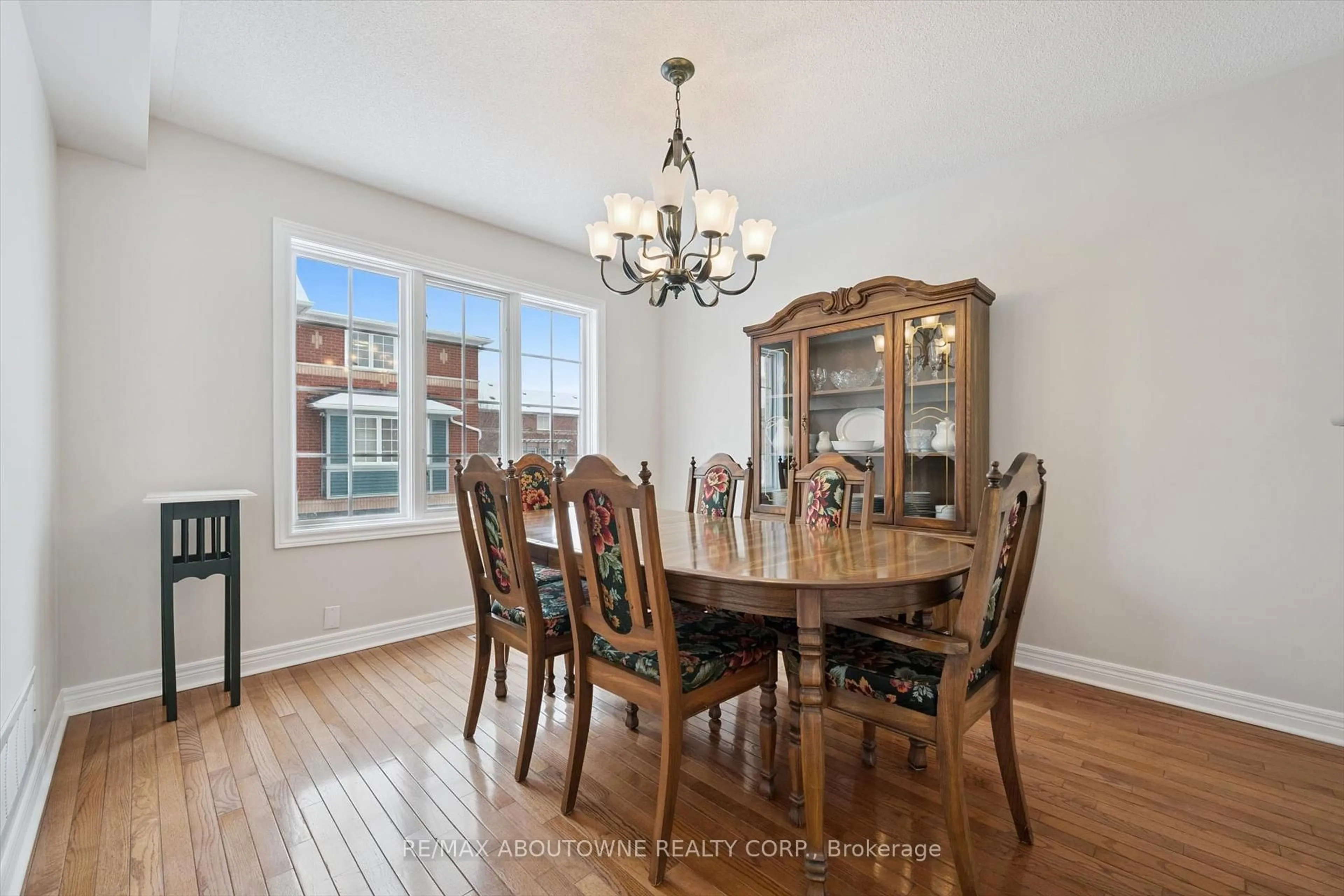 Dining room, wood/laminate floor for 5031 East Mill Rd #40, Mississauga Ontario L5V 2M5