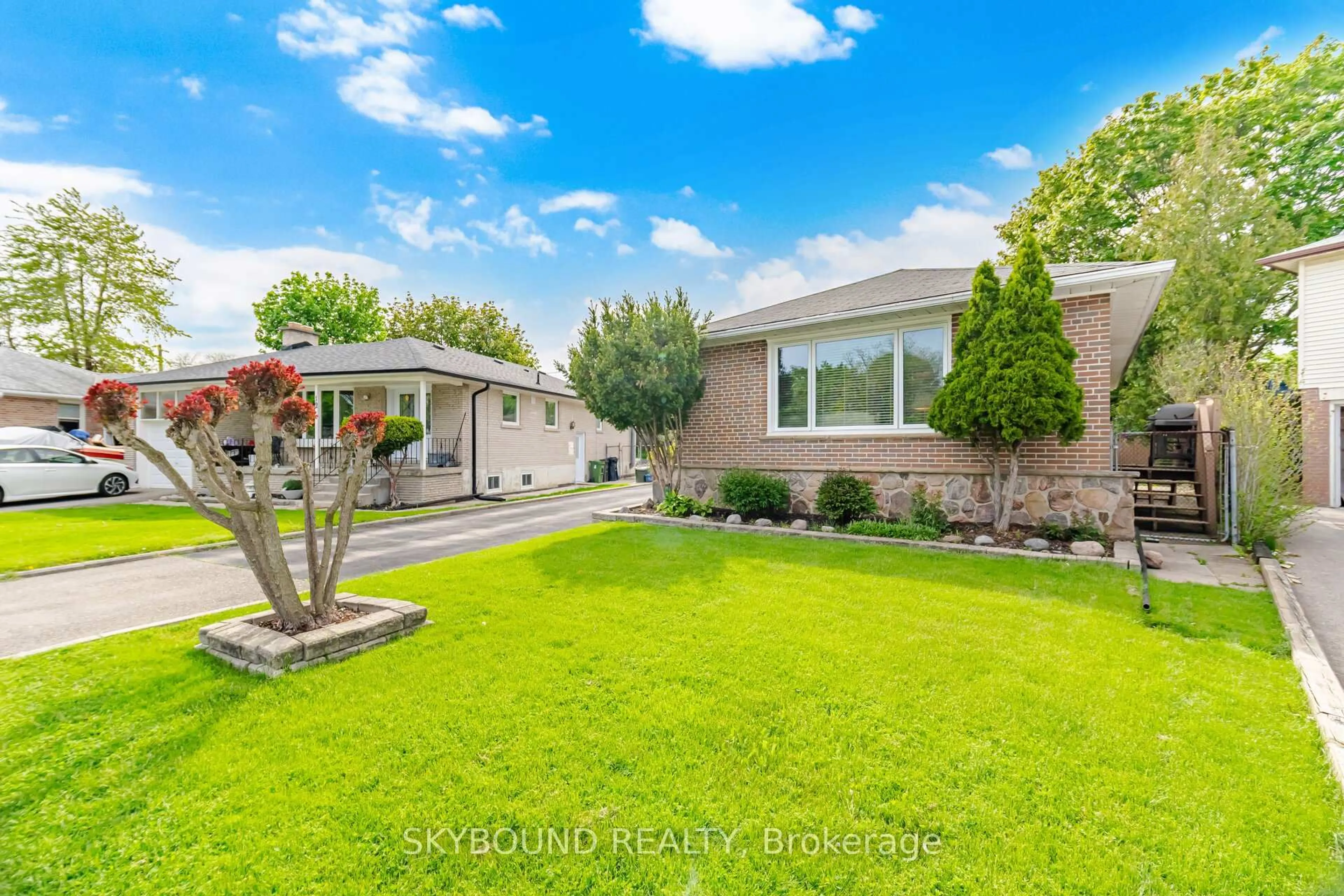 A pic from outside/outdoor area/front of a property/back of a property/a pic from drone, street for 14 Monet Ave, Toronto Ontario M9C 3N7