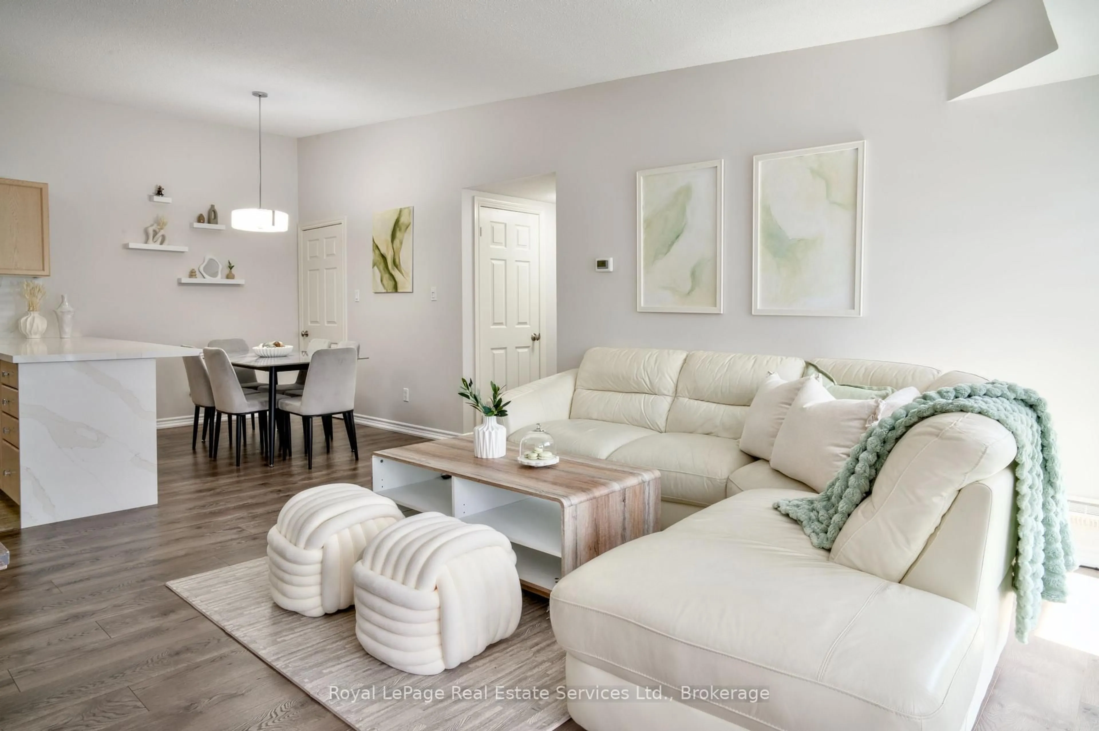 Living room with furniture, wood/laminate floor for 1701 Lampman Ave #507, Burlington Ontario L7L 6R9