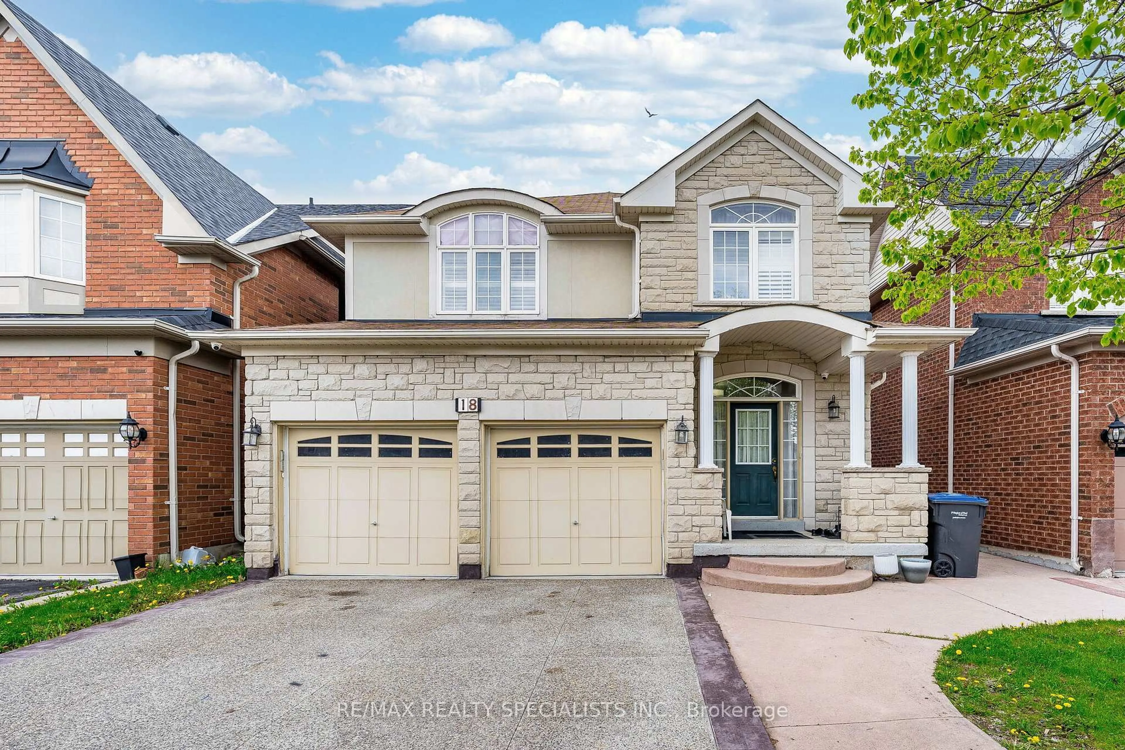 Home with brick exterior material, street for 18 Long Meadow Rd, Brampton Ontario L6P 2A2