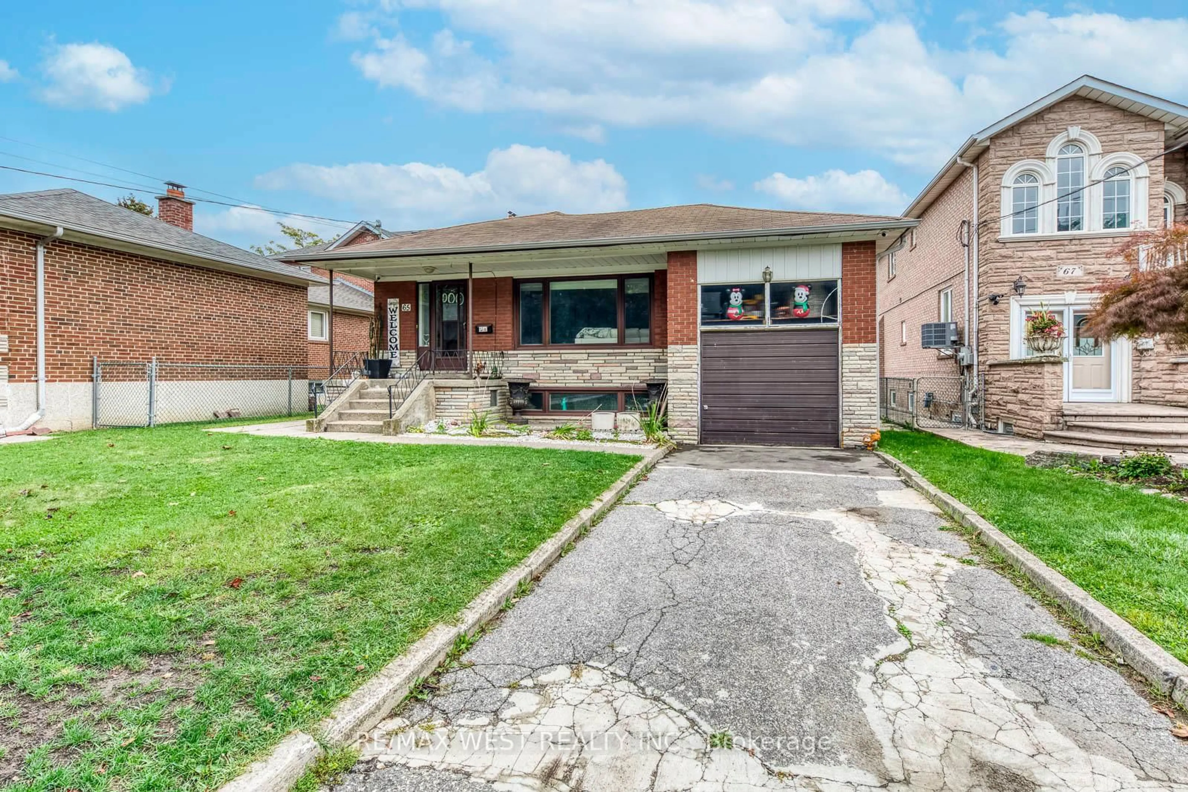 Home with brick exterior material, street for 65 North Park Dr, Toronto Ontario M6L 1K4