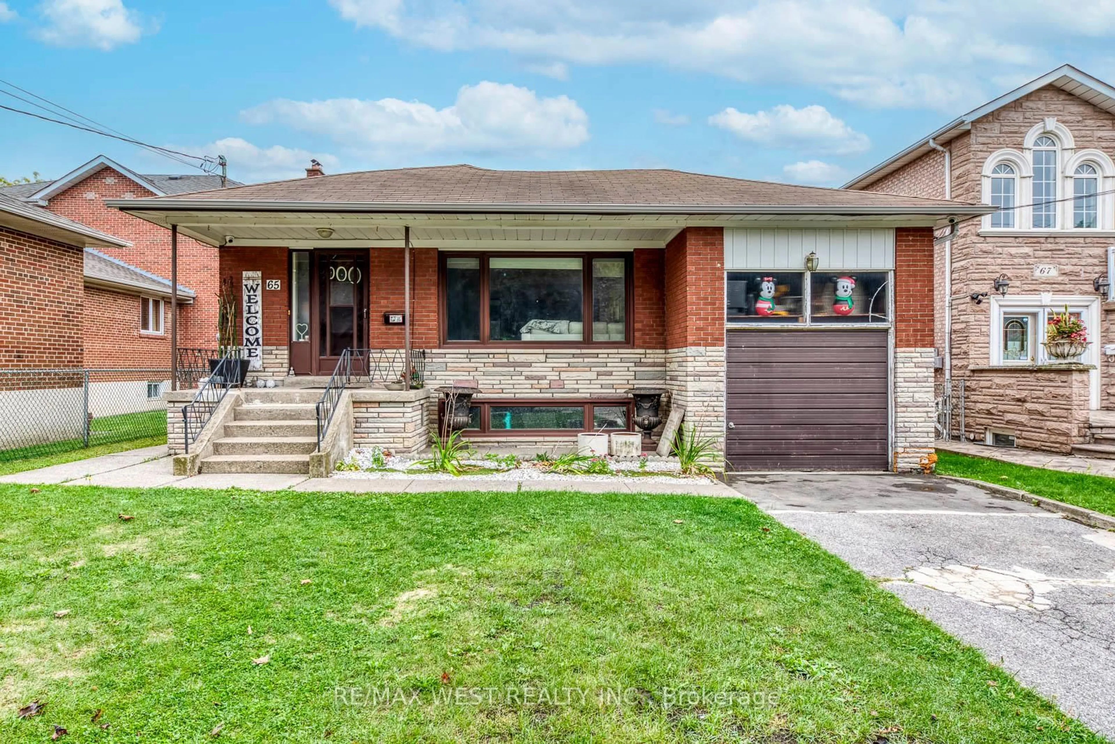 Home with brick exterior material, street for 65 North Park Dr, Toronto Ontario M6L 1K4