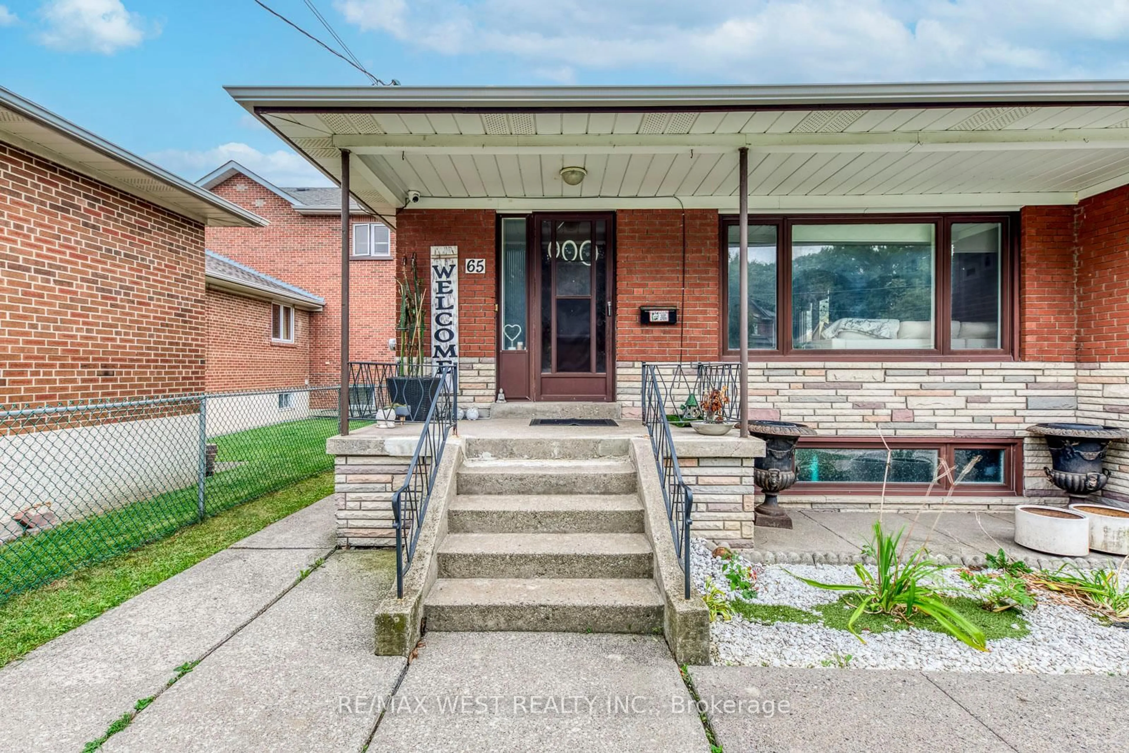 Home with brick exterior material, street for 65 North Park Dr, Toronto Ontario M6L 1K4