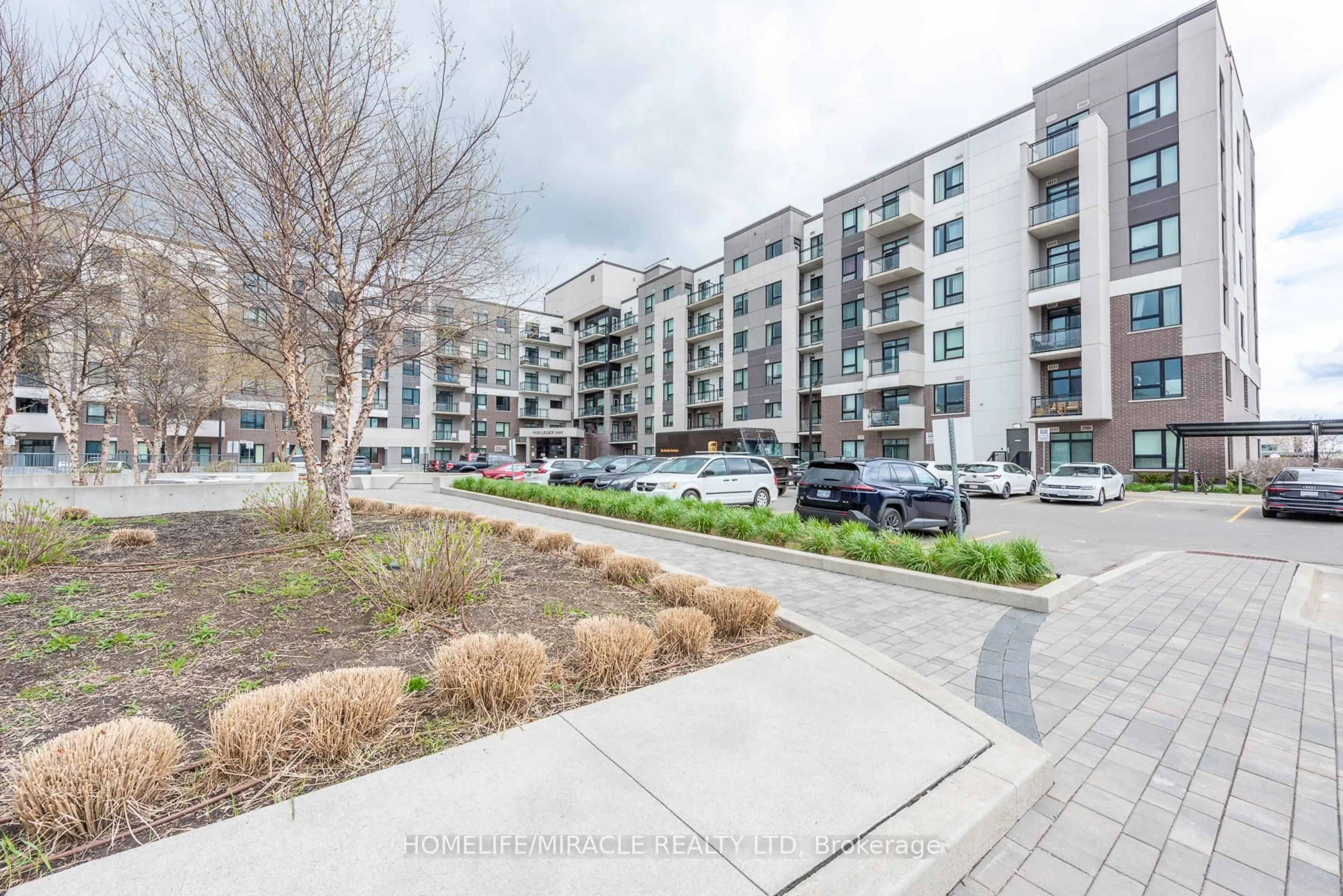 A pic from outside/outdoor area/front of a property/back of a property/a pic from drone, street for 1105 Leger Way #421, Milton Ontario L9E 1K7