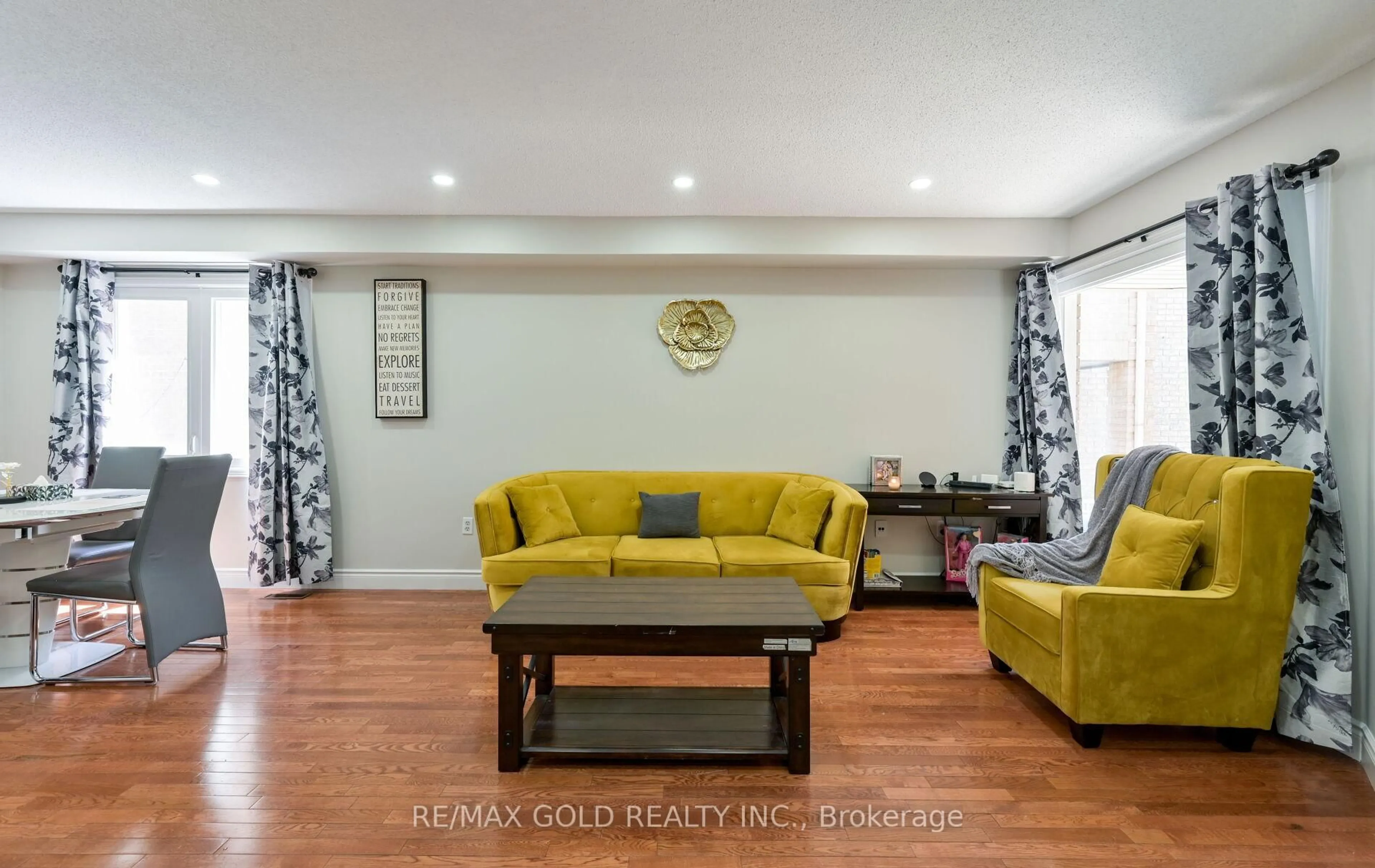 Living room with furniture, wood/laminate floor for 171 Fernforest Dr, Brampton Ontario L6R 1T7