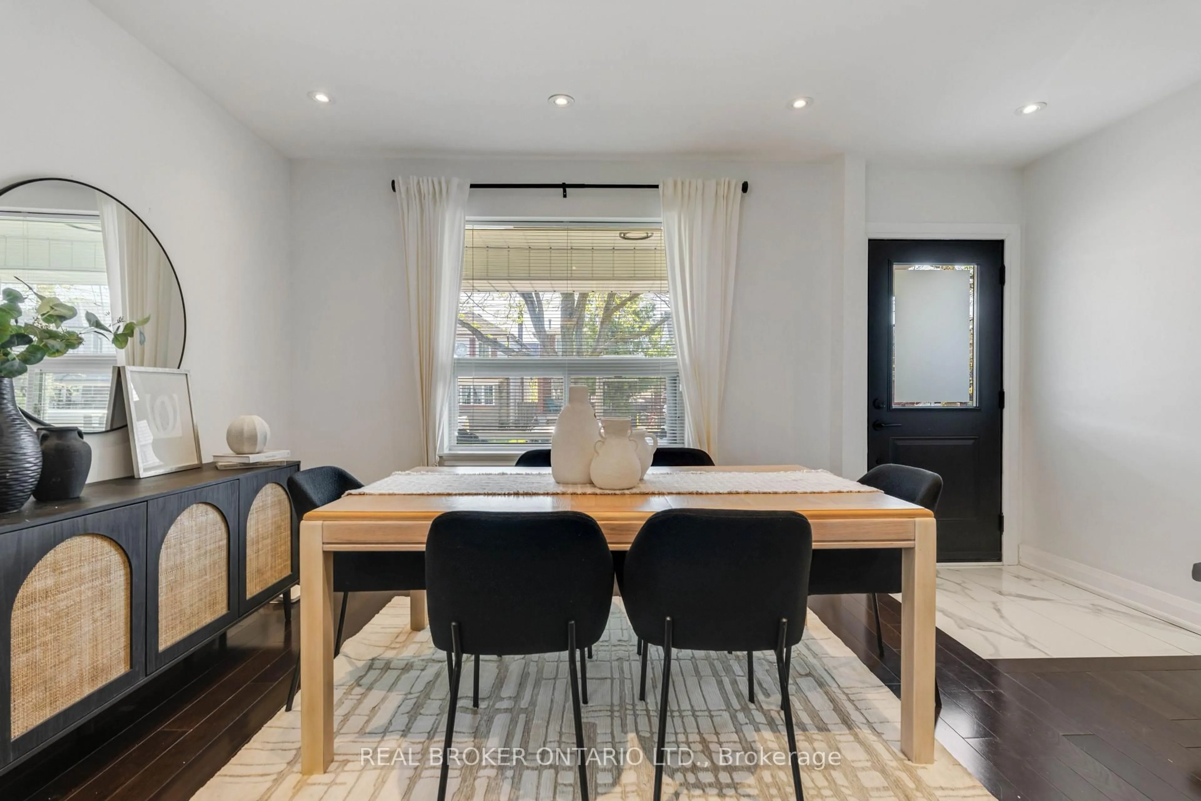 Dining room, wood/laminate floor for 57 Scott Rd, Toronto Ontario M6M 3T1