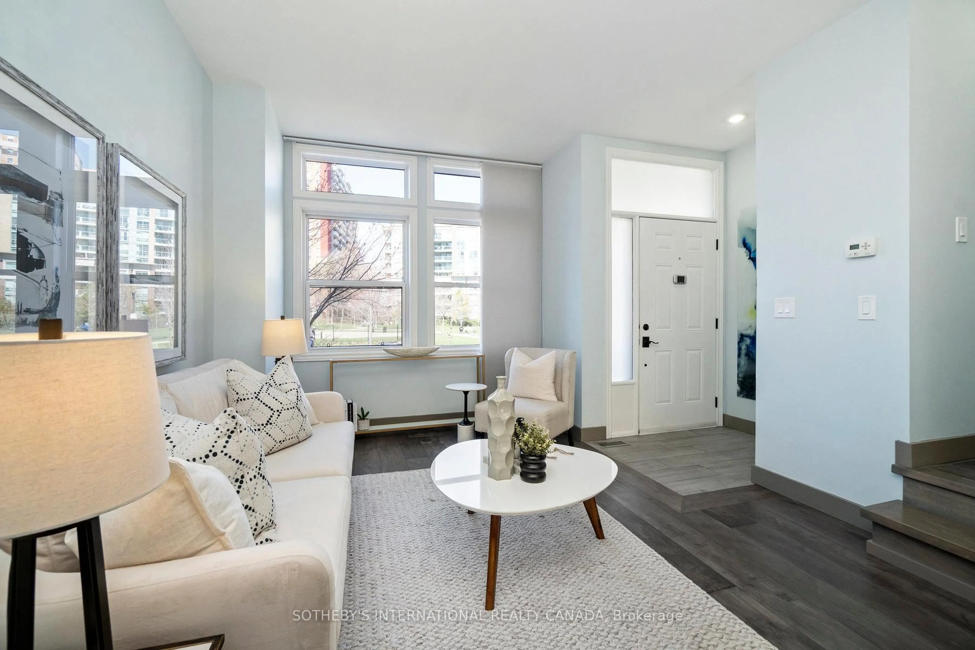 Living room with furniture, unknown for 30 Michael Power Pl, Toronto Ontario M9A 5G9