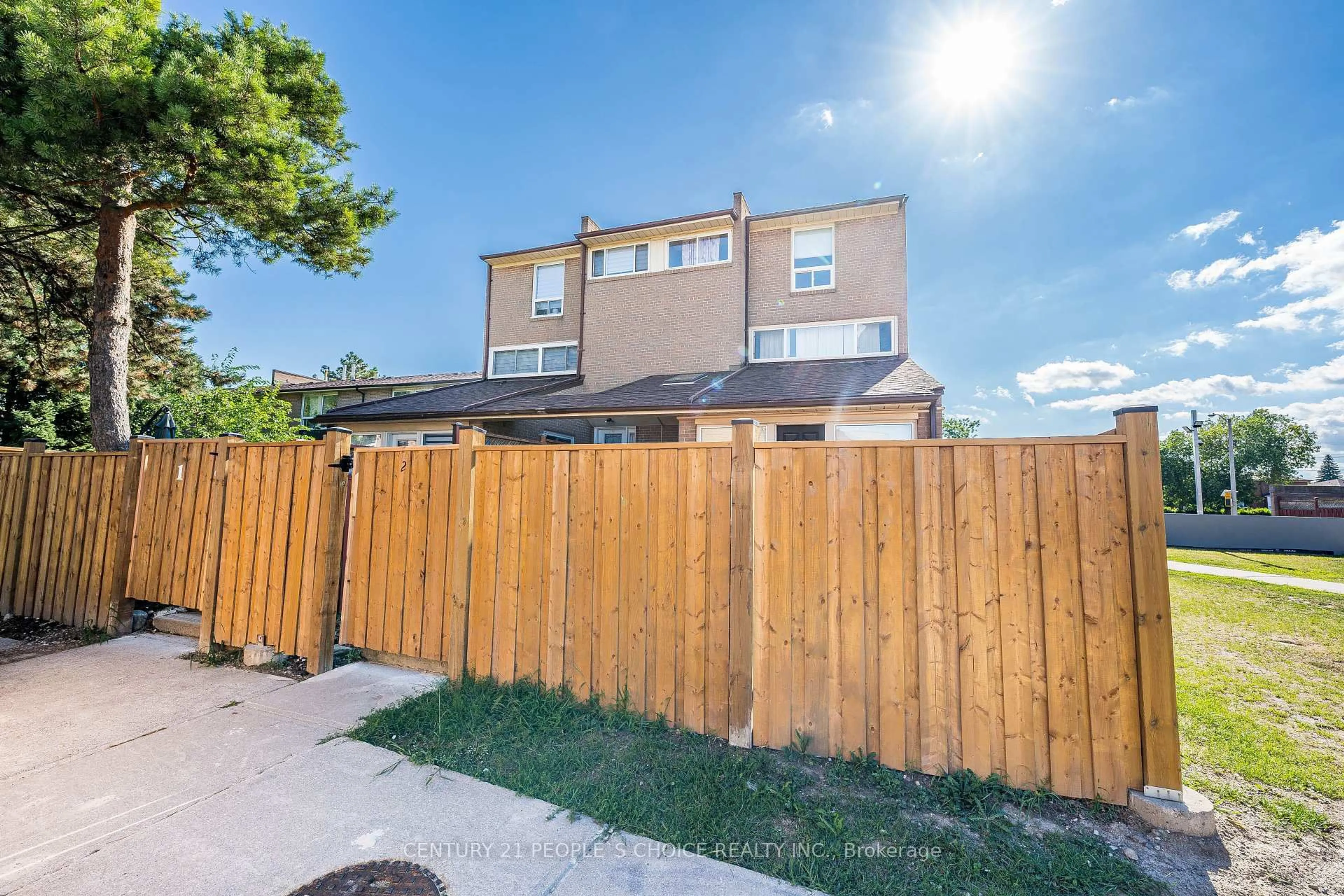 A pic from outside/outdoor area/front of a property/back of a property/a pic from drone, street for 242 John Garland Blvd #2, Toronto Ontario M9V 1N8