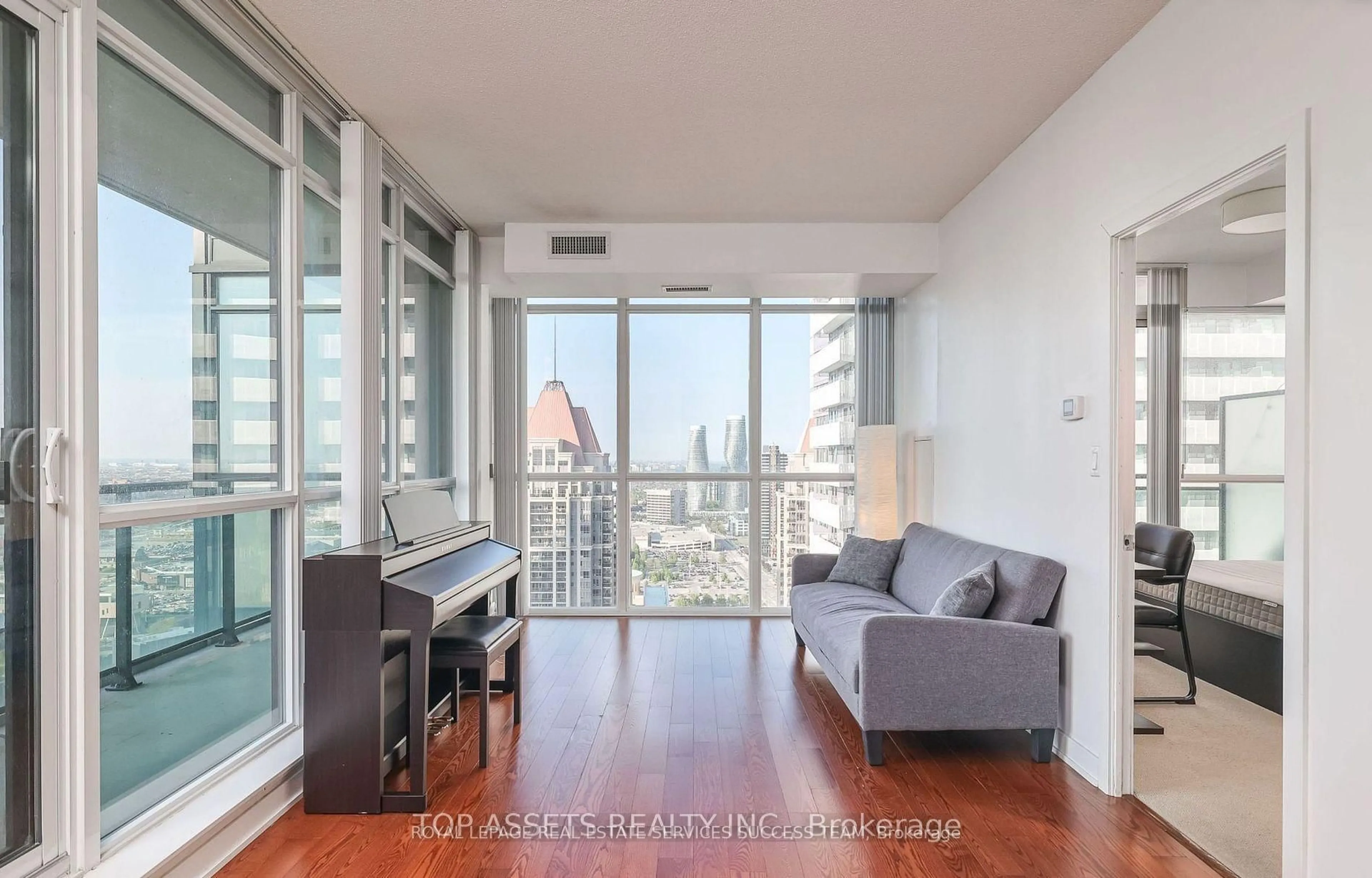Living room with furniture, unknown for 4070 Confederation Pkwy #3009, Mississauga Ontario L5B 0E9