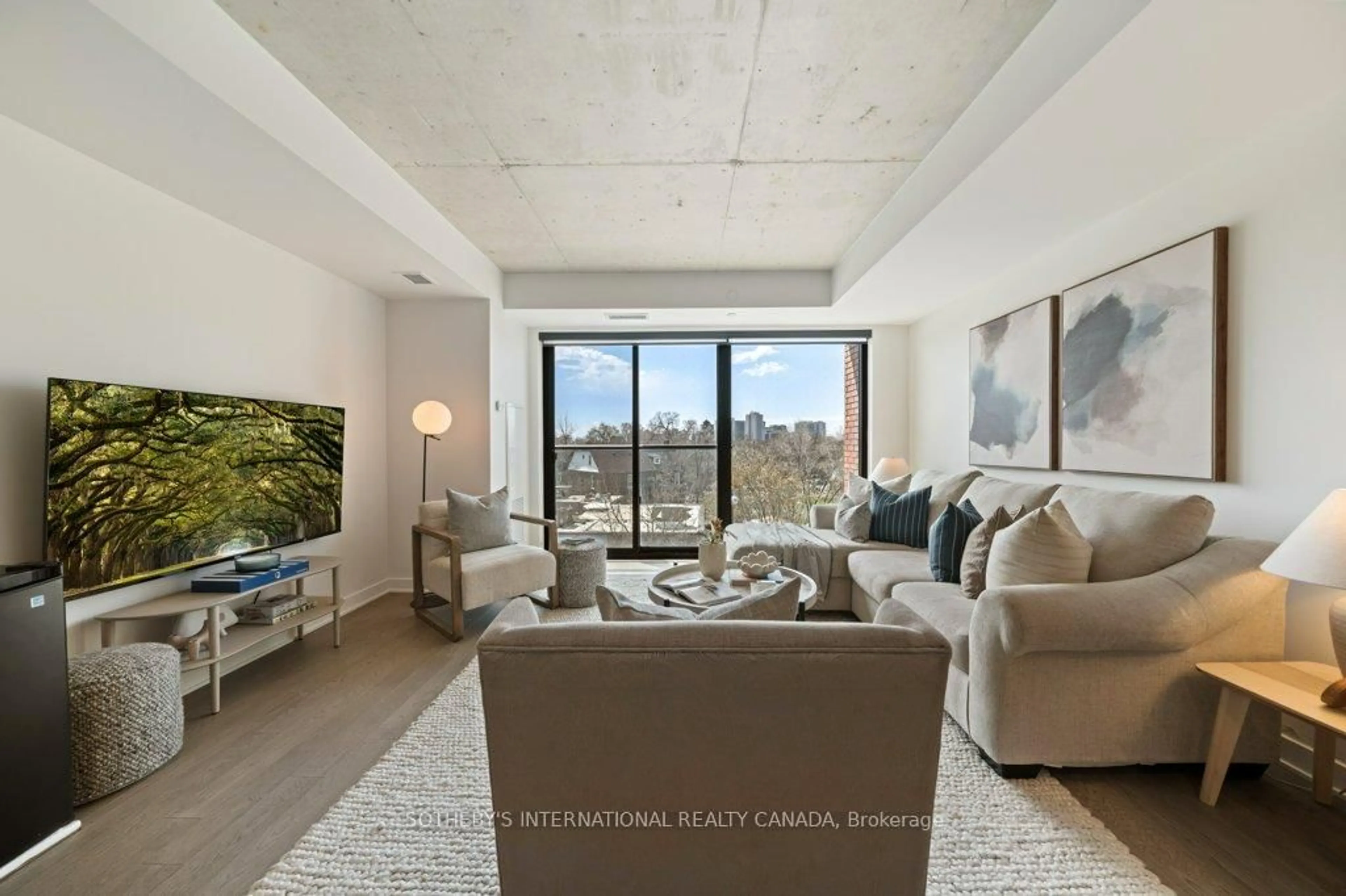 Living room with furniture, unknown for 2720 Dundas St #323, Toronto Ontario M6P 1Y2