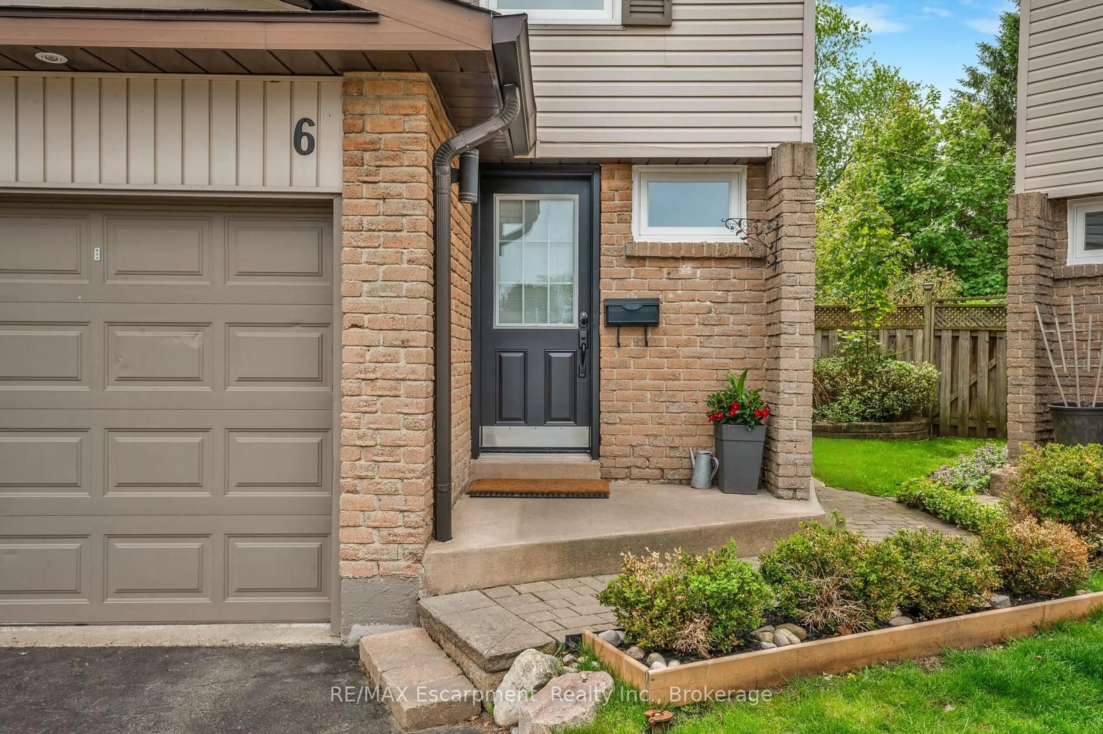 Home with brick exterior material, street for 2411 Sovereign St #6, Oakville Ontario L6L 1M1
