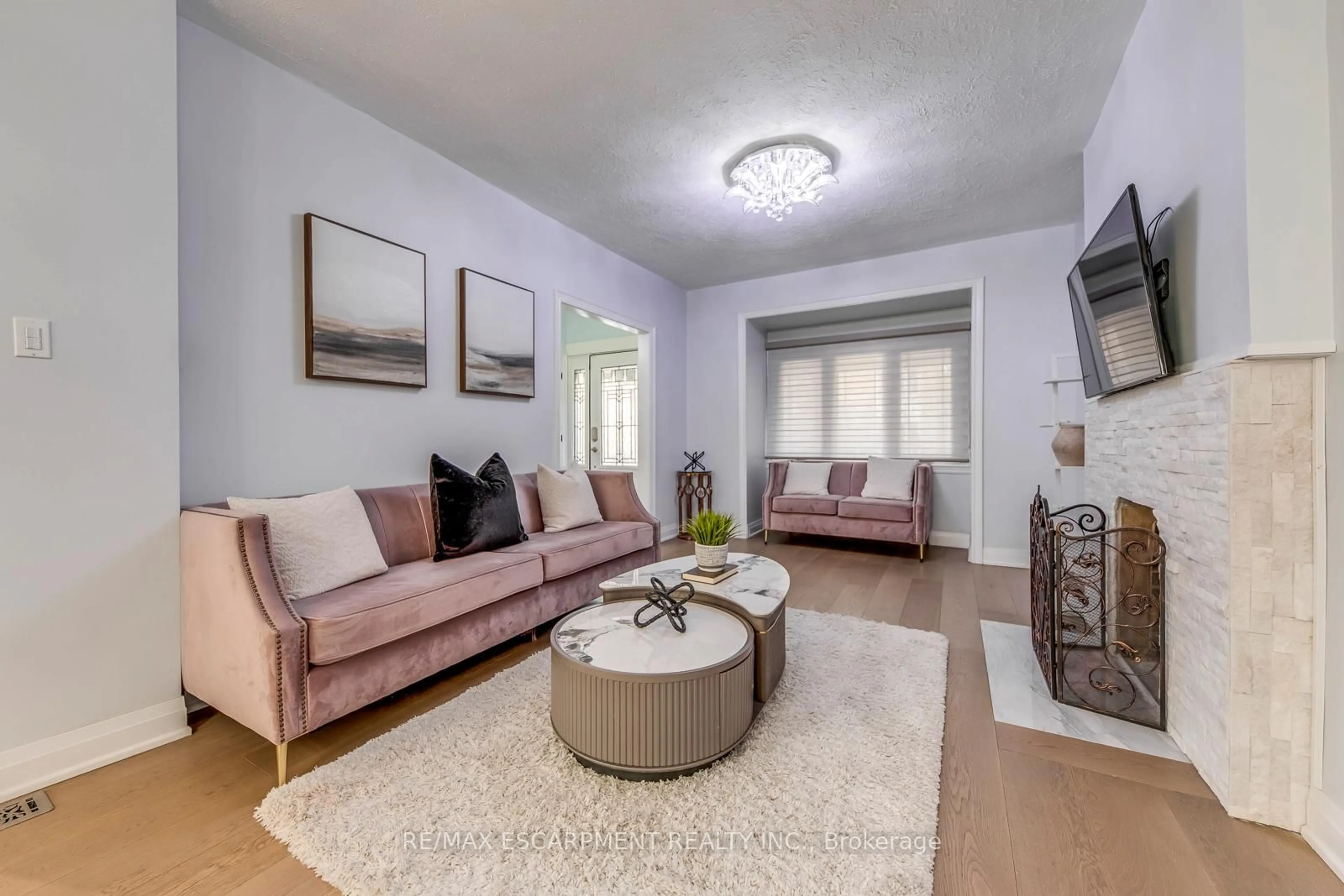 Living room with furniture, unknown for 108 Runnymede Rd, Toronto Ontario M6S 2Y3