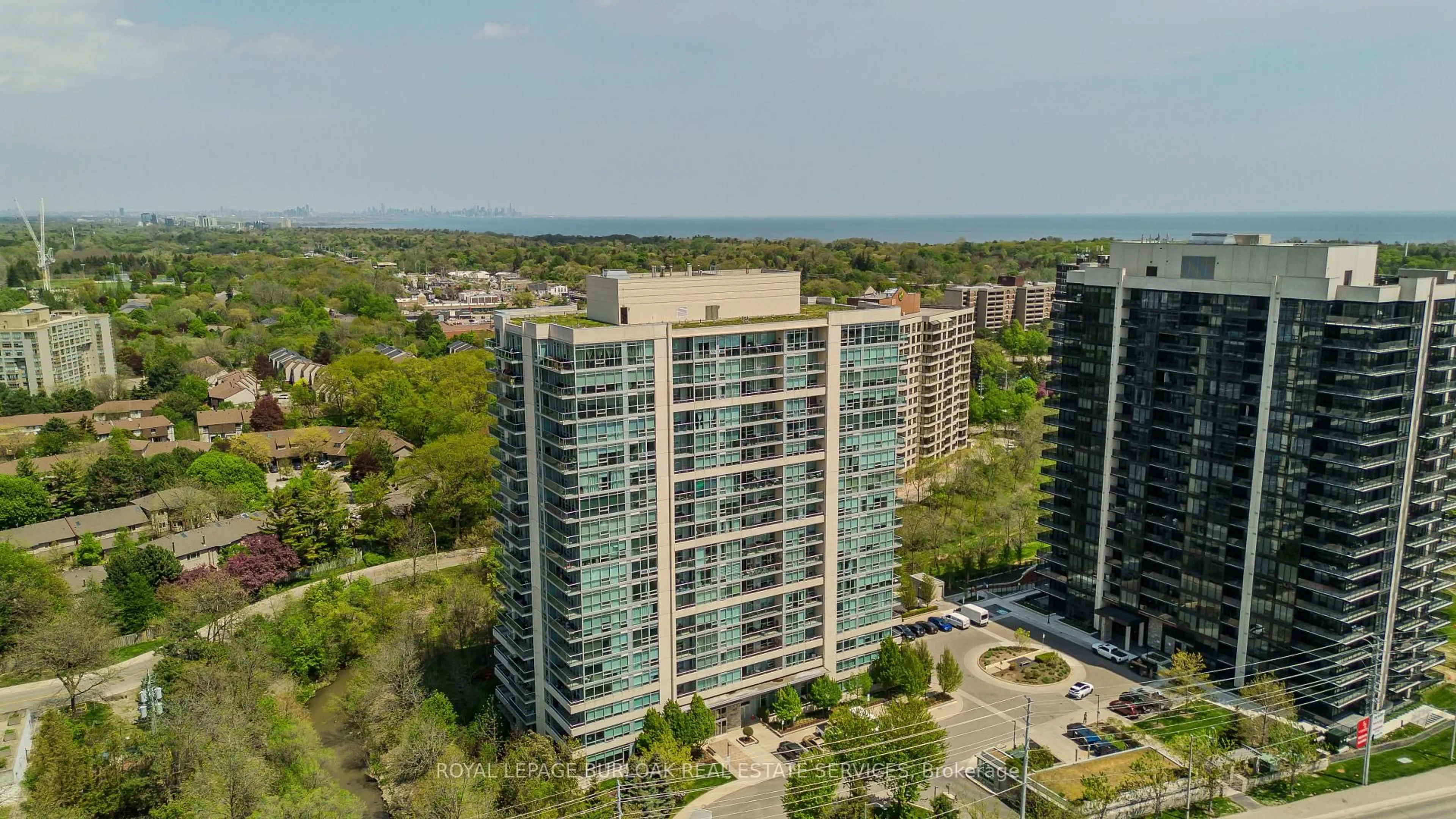 A pic from outside/outdoor area/front of a property/back of a property/a pic from drone, city buildings view from balcony for 1055 Southdown Rd #312, Mississauga Ontario L5J 0A3