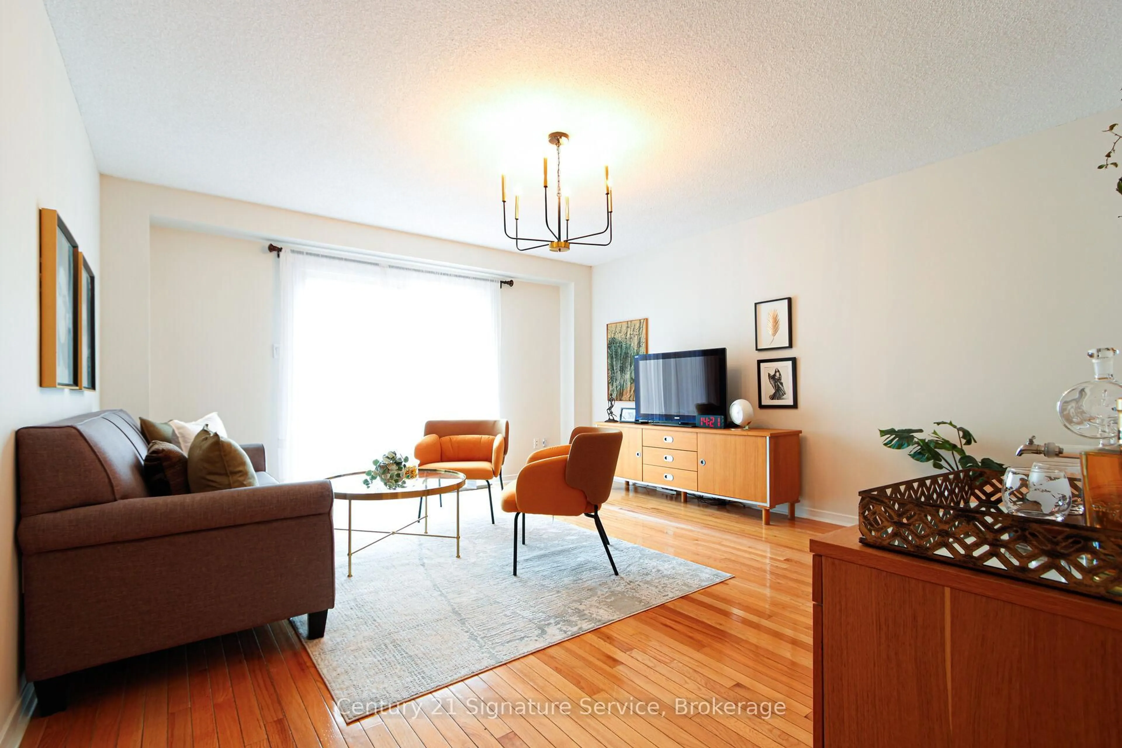 Living room with furniture, wood/laminate floor for 2395 Stefi Tr, Oakville Ontario L6H 5Y5