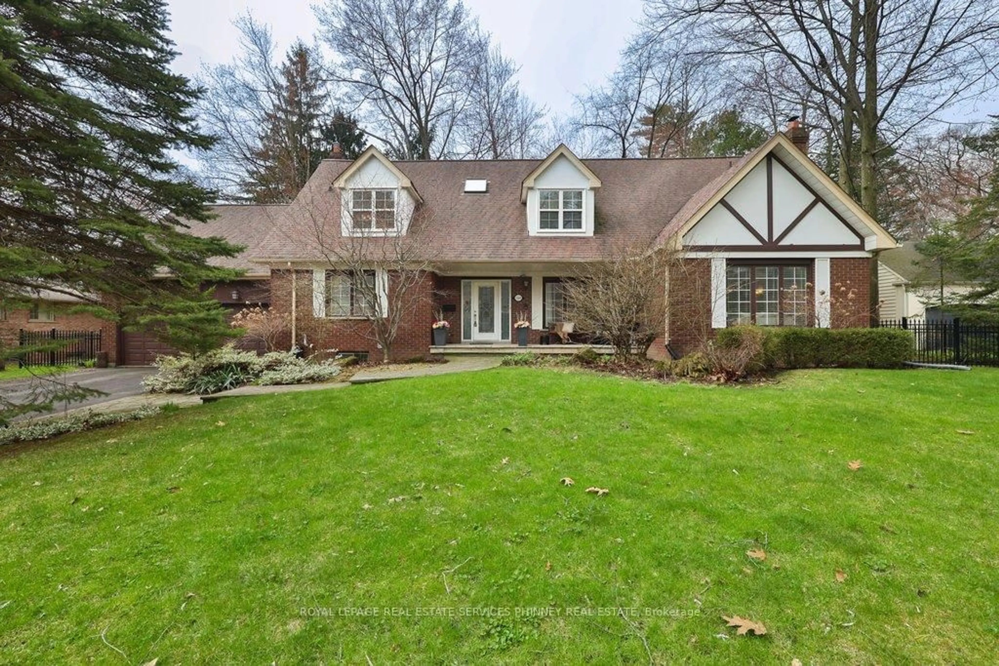 Home with brick exterior material, street for 1244 Woodland Ave, Mississauga Ontario L5G 2X9