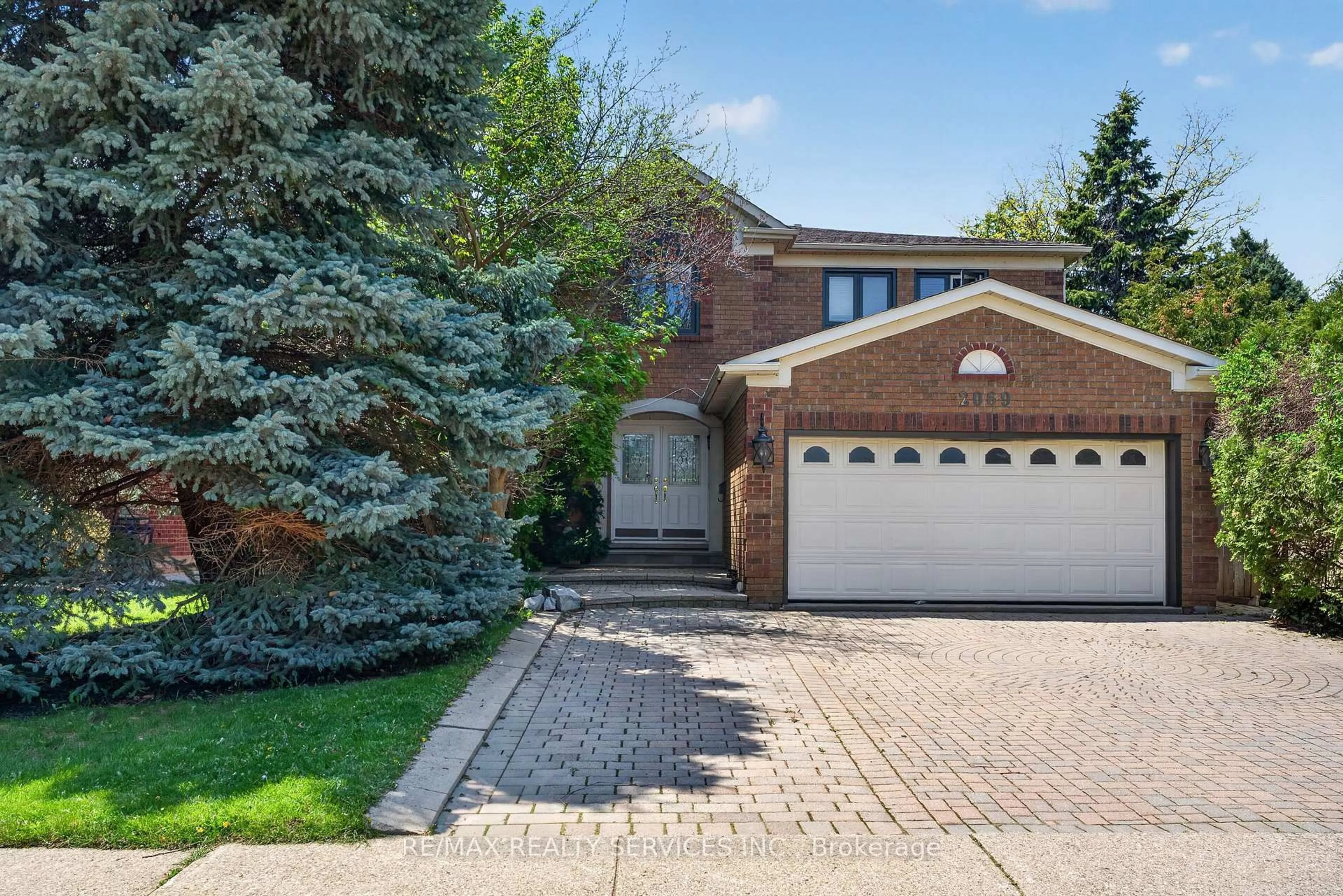 Home with brick exterior material, street for 2069 Schoolmaster Circ, Oakville Ontario L6M 3A1