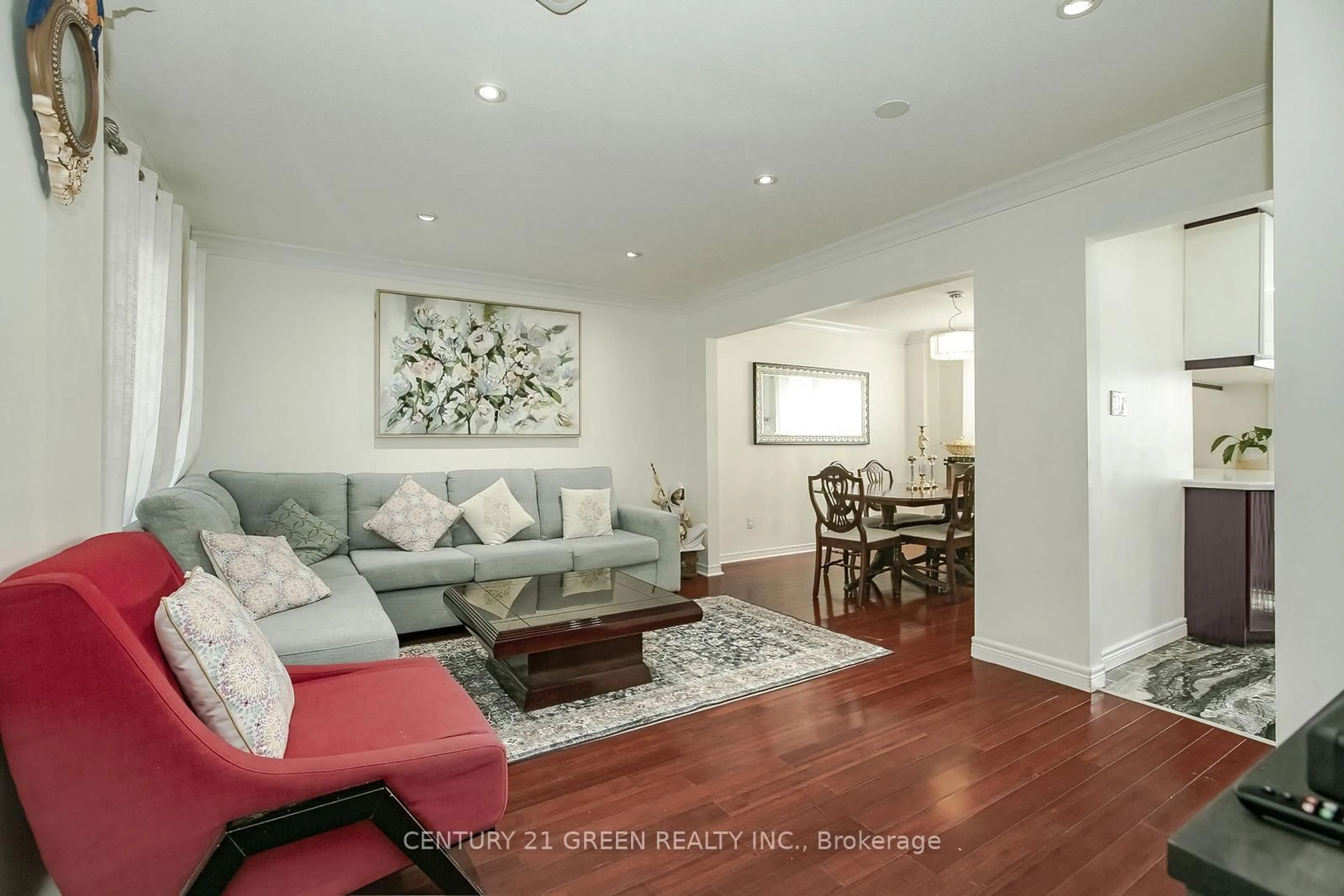 Living room with furniture, wood/laminate floor for 231 Murray St, Brampton Ontario L6X 3M1