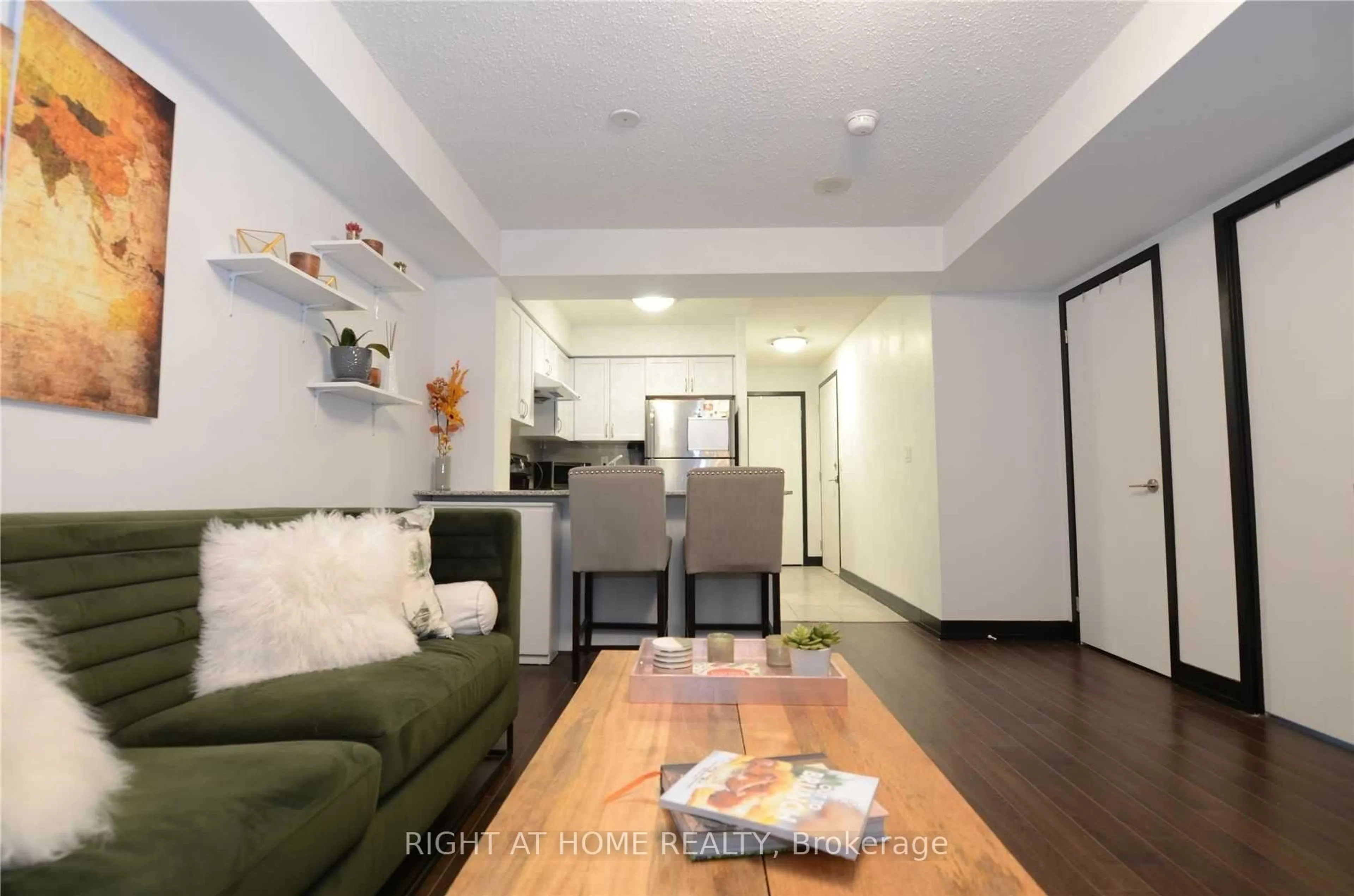 Living room with furniture, wood/laminate floor for 812 Lansdowne Ave #1016, Toronto Ontario M6H 4K5