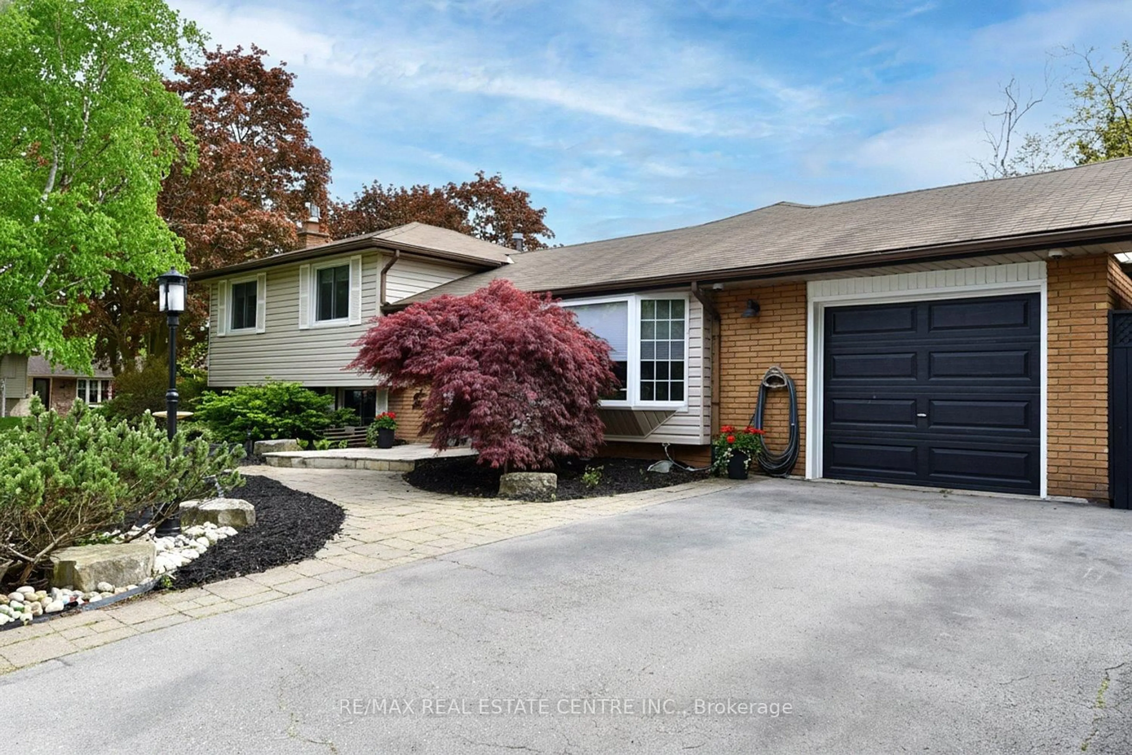 Home with brick exterior material, street for 5187 Cedarbrook Cres, Burlington Ontario L7L 3P9
